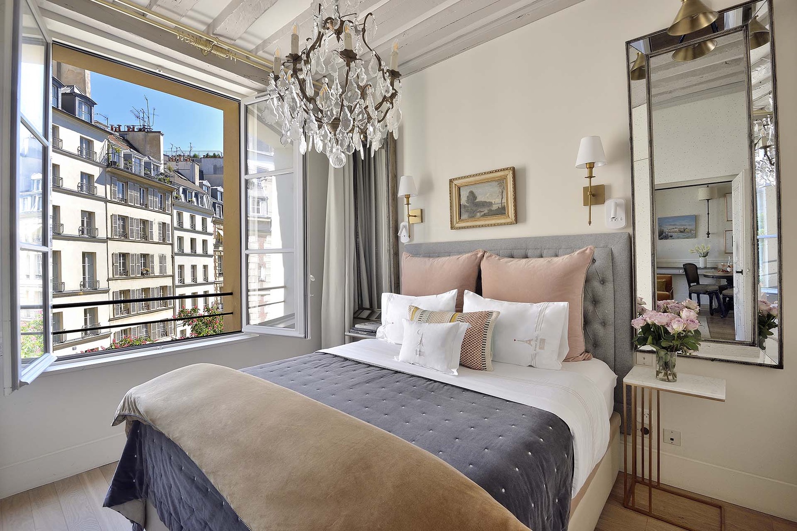 Wake up to the pretty views of Place Dauphine from the bedroom window.