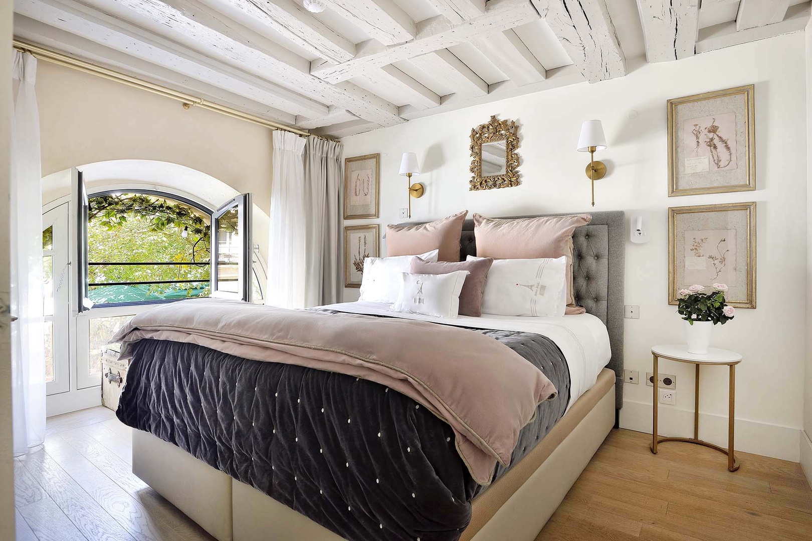 Enjoy the sumptuous bed and tasteful décor in bedroom 1.