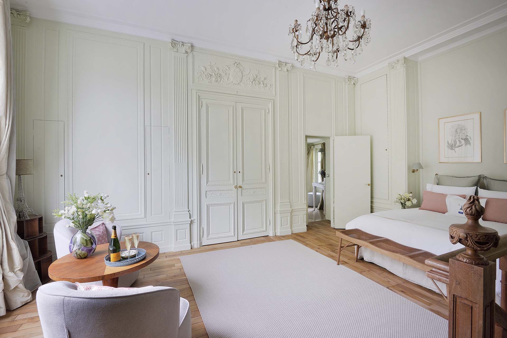 Large closet and en suite bathroom in bedroom.