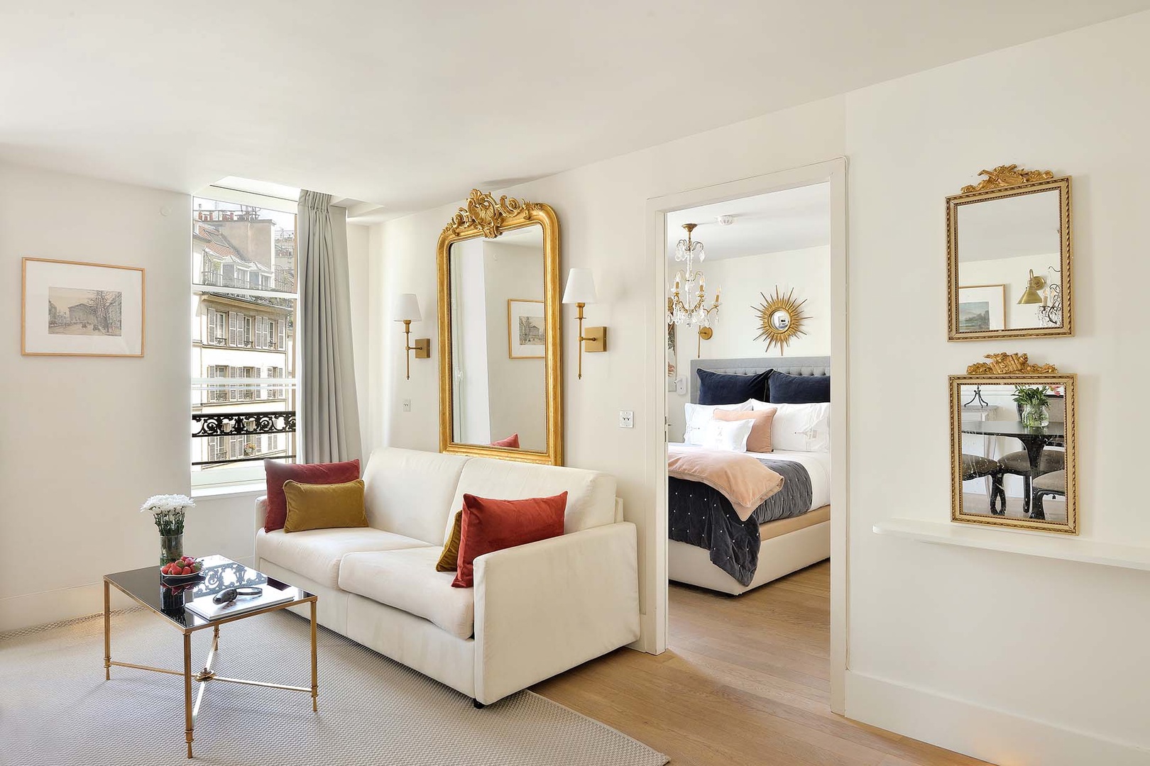 Beautiful large windows overlook charming Place Dauphine!