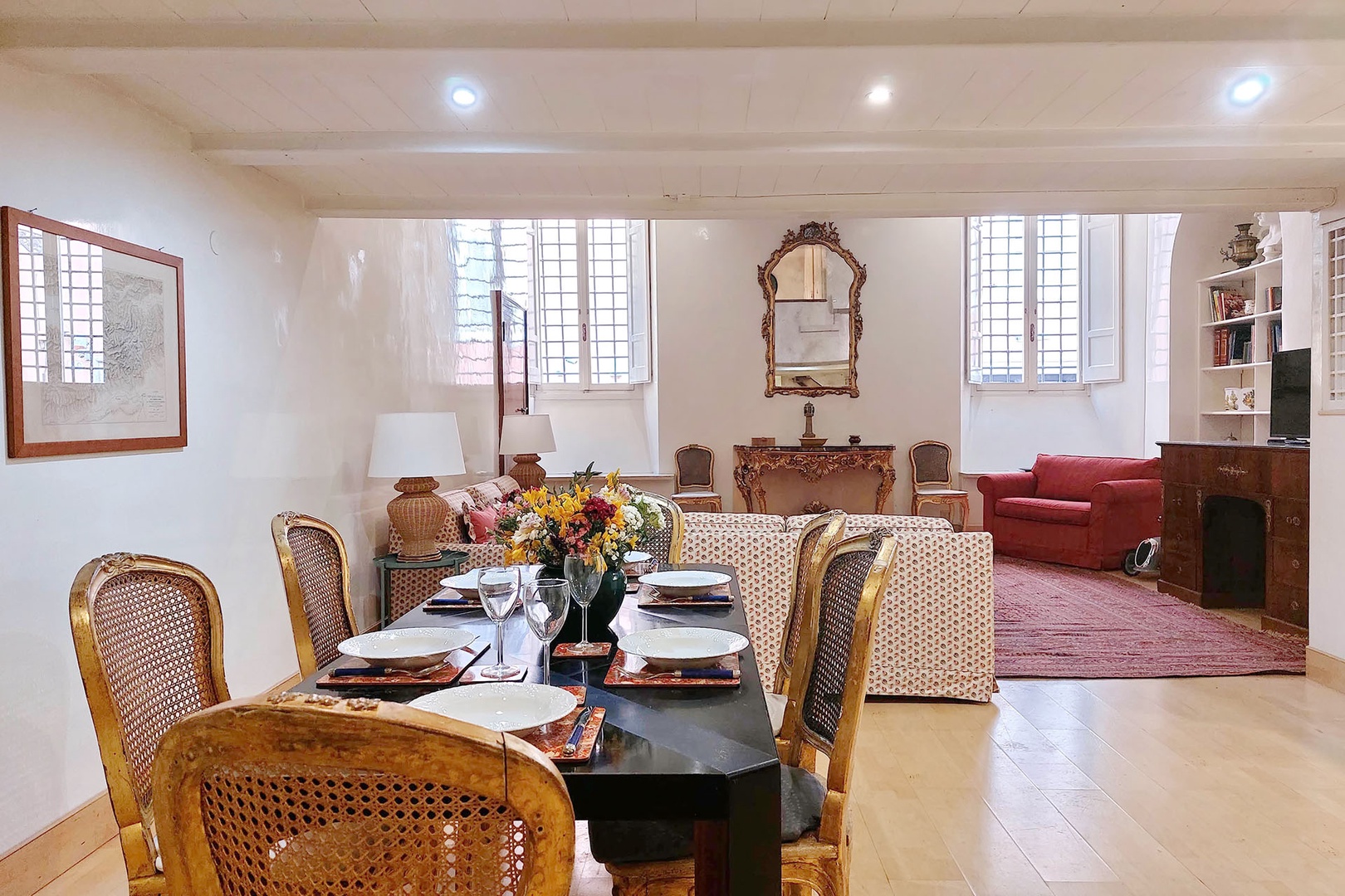Spacious dining area is under the loft.