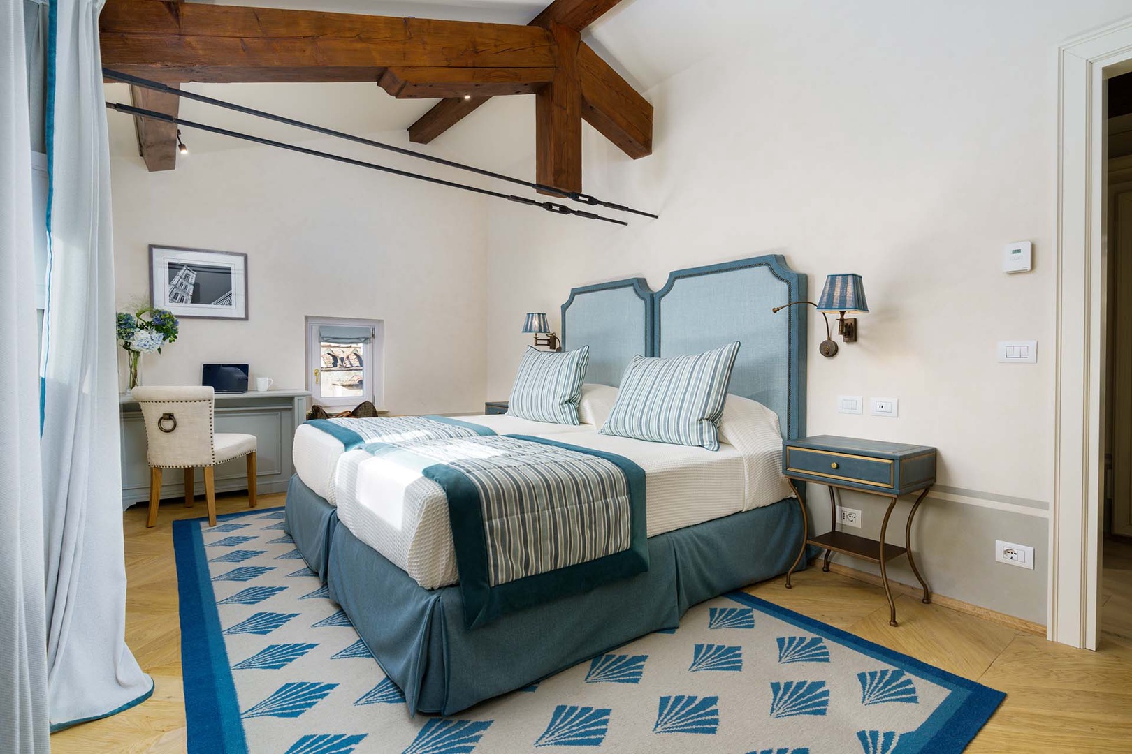 Bedroom 3 has lovely blue decor and full en suite bathroom.