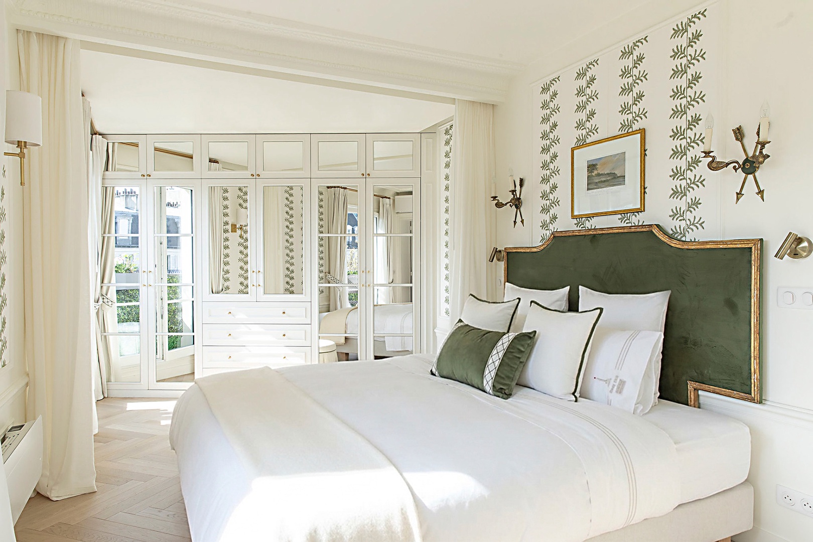 Spacious bedroom 1 with mirrored wardrobe.