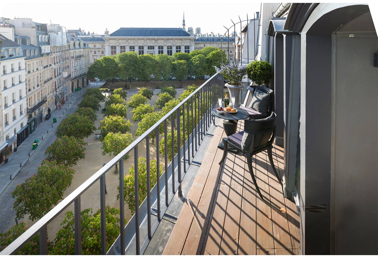 Enjoy your private balcony with a beautiful view of Place Dauphine !
