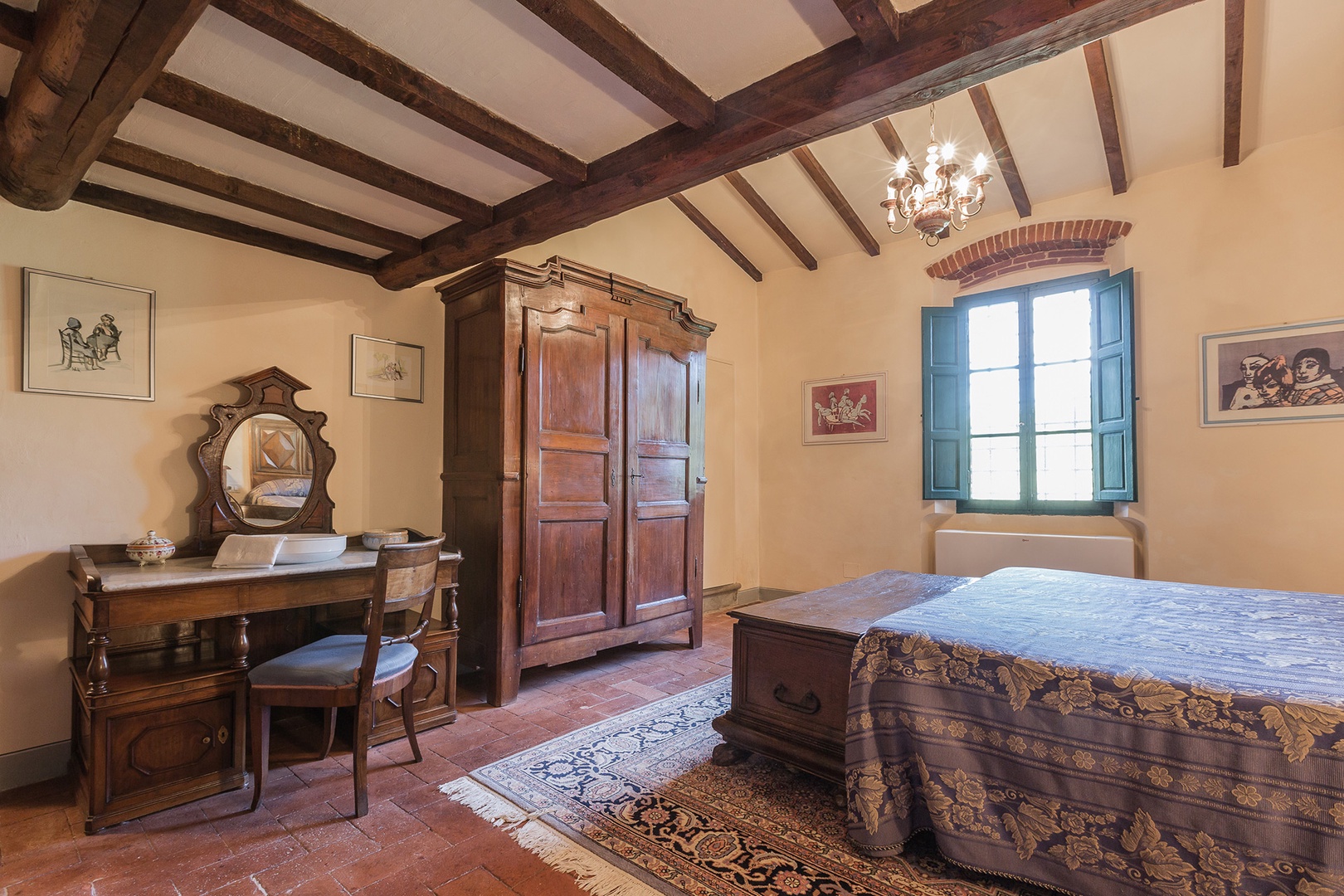 Nice antiques in bedroom 4. The en suite bath features a Jacuzzi shower.