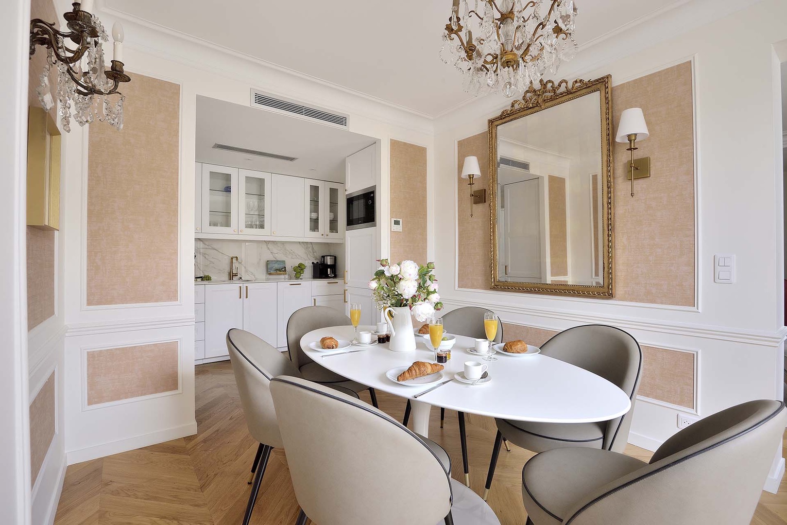 Dinning area opens to a fully-equipped kitchen.