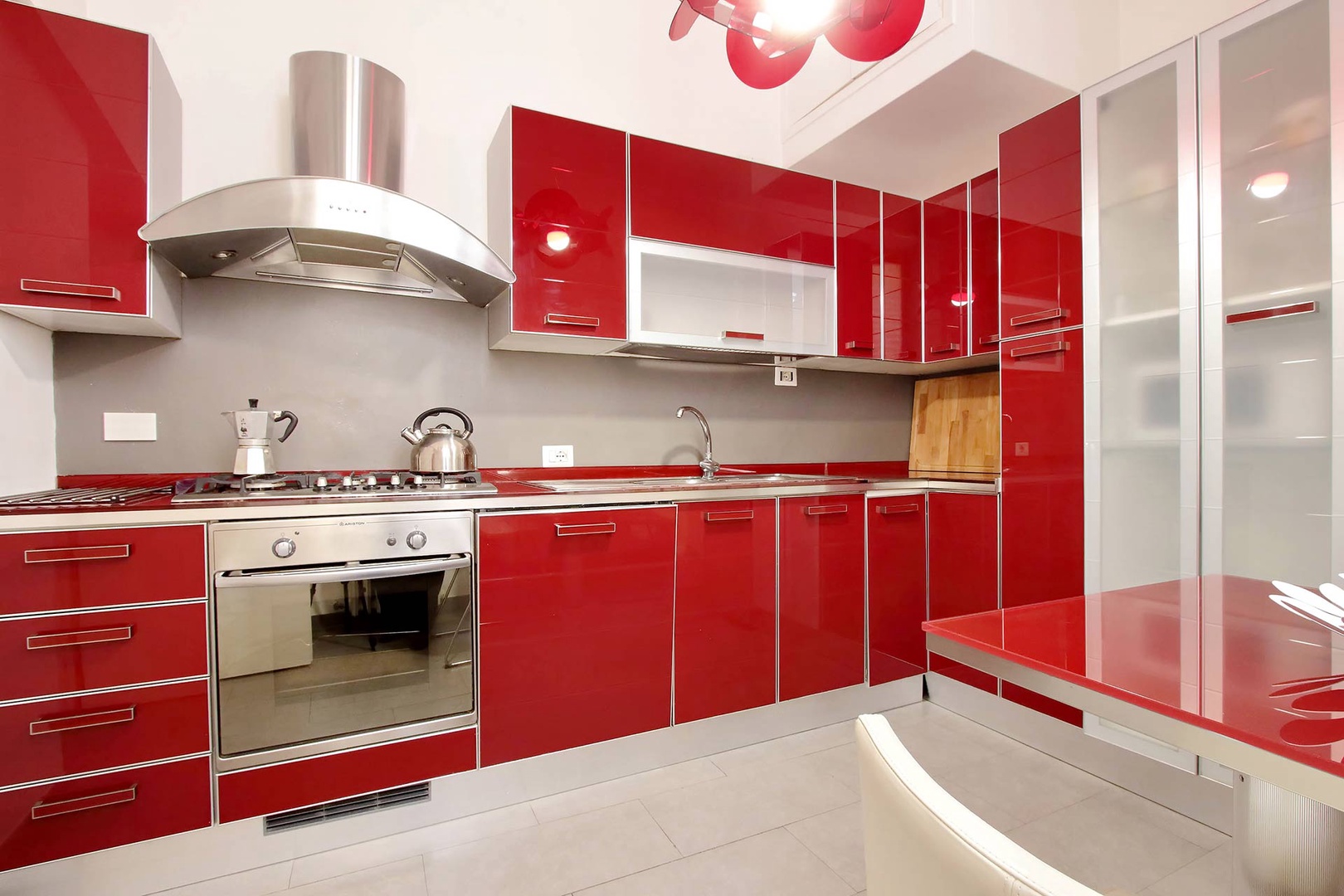 The bright and fully equipped kitchen is perfect for cooking at home.