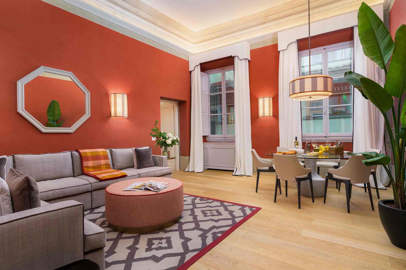 Zaffiro welcomes you with vibrant open-plan living space with warm terracotta walls and elegant molded ceilings.