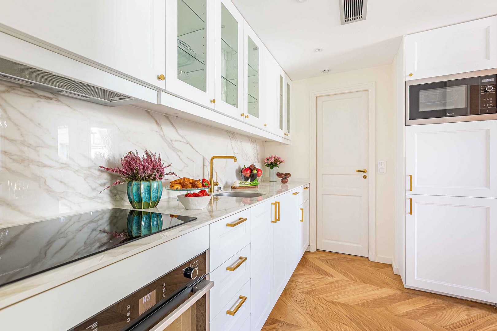 Second bathroom is through the doorway in the kitchen.