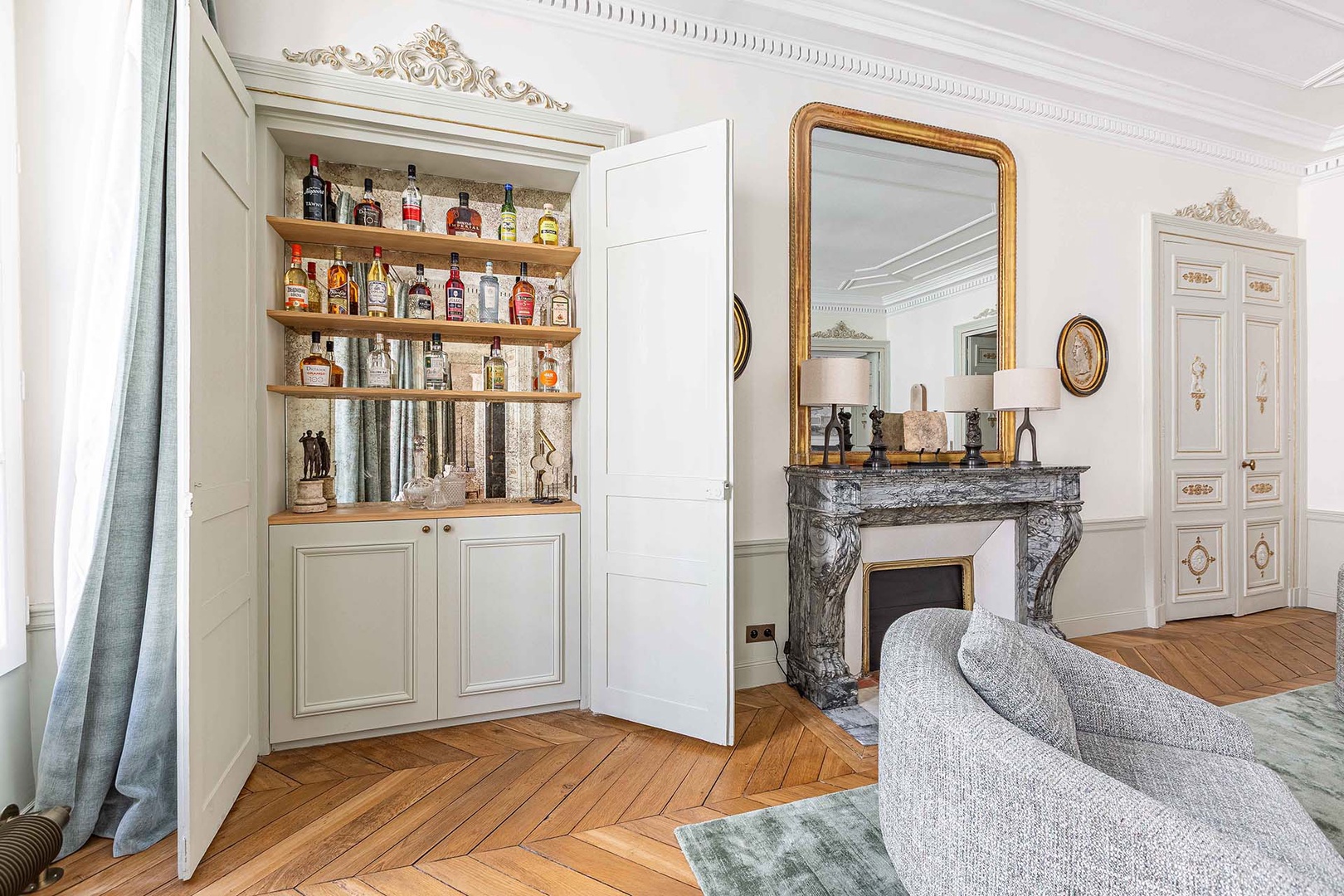 Hidden bar cabinet in the living room.