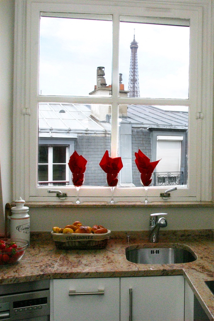 Watch the Eiffel Tower as you prepare meals.