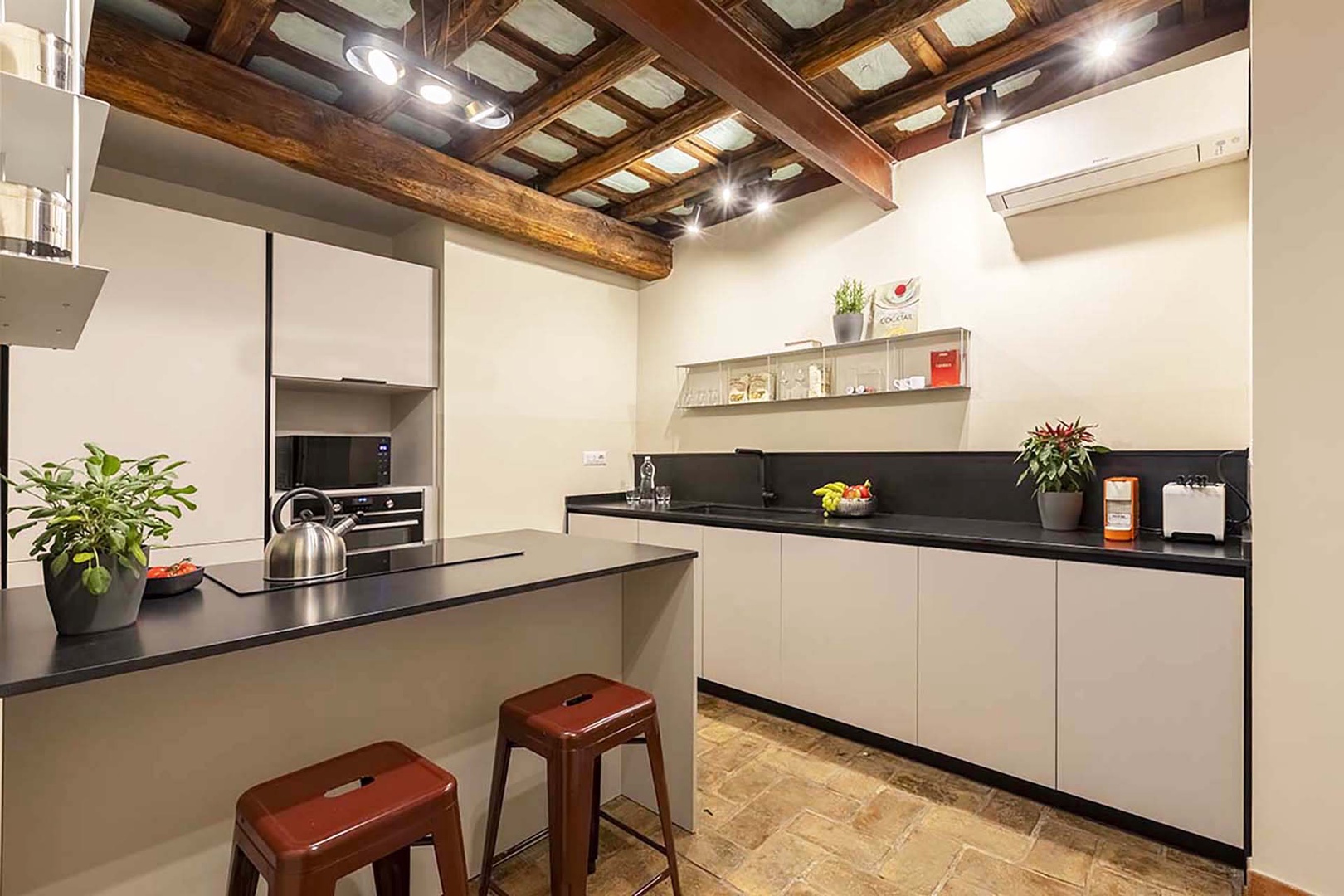 Fully equipped modern kitchen with loads of counter space.