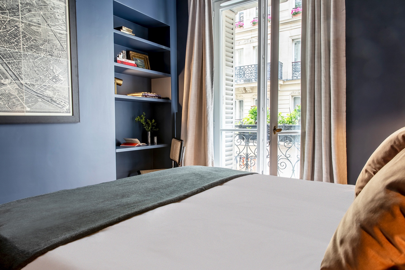 Enjoy views of classic Parisian architecture from bedroom 2.