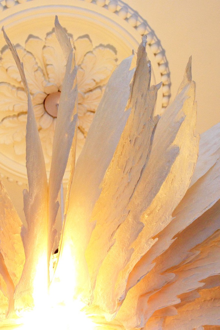 Delicate light fitting in the bedroom