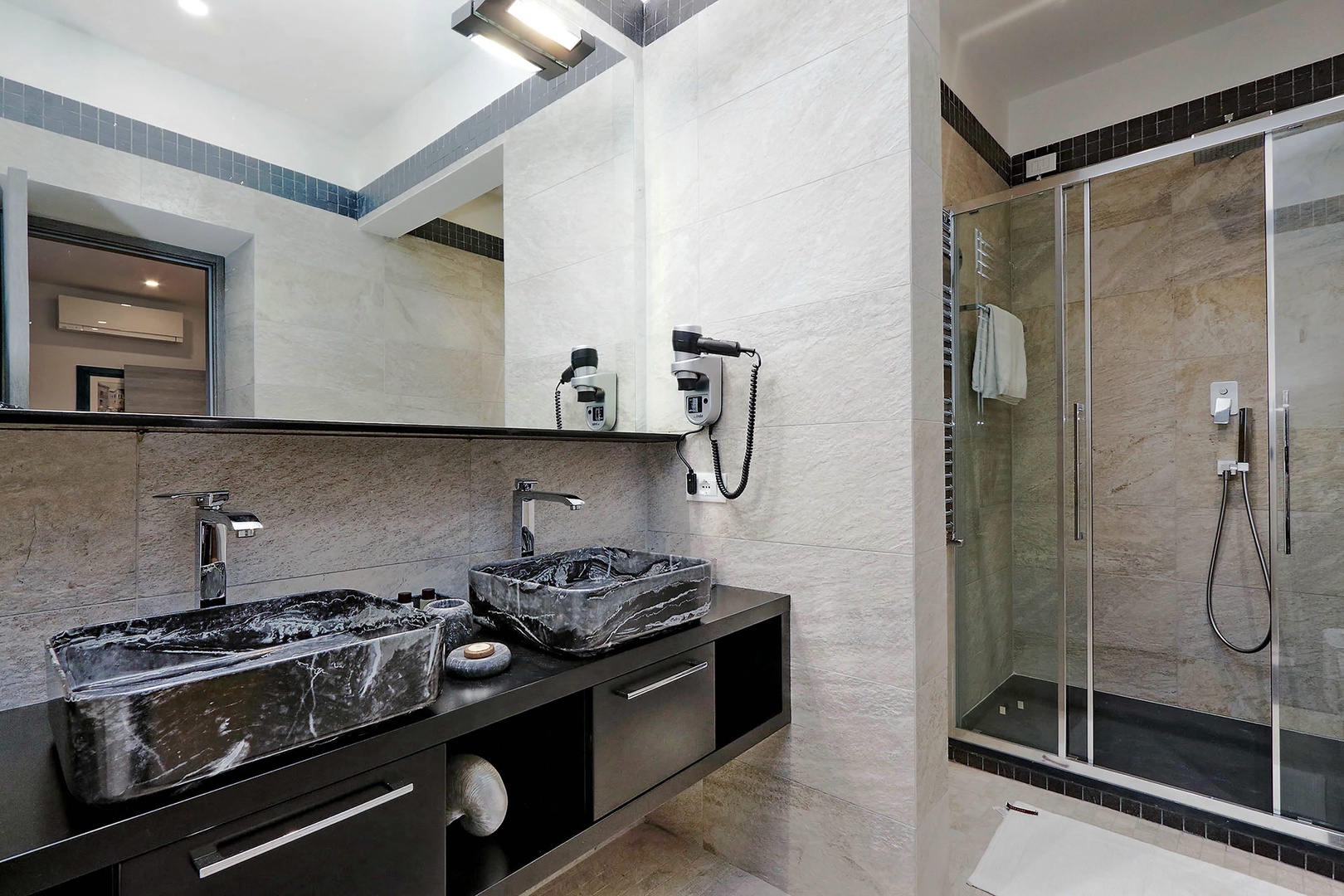 Elegant double sinks in en suite bathroom 2.