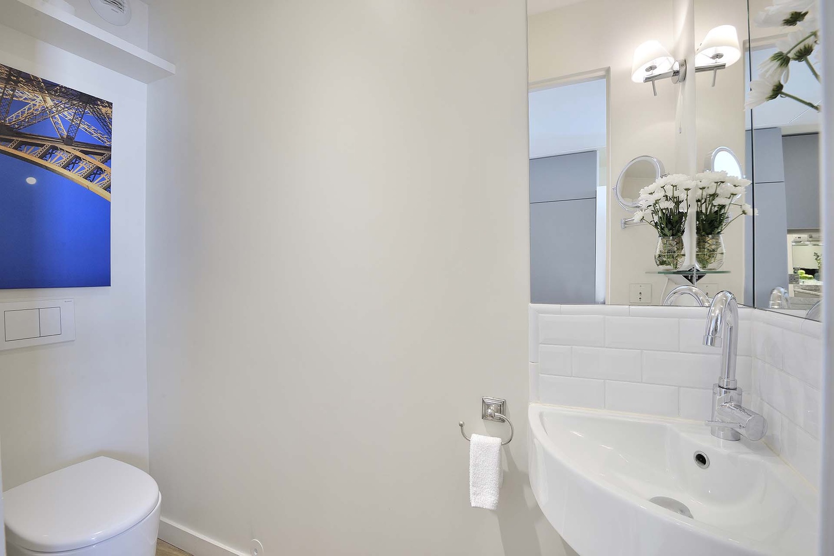 There is a practical separate half bath next to the kitchen.