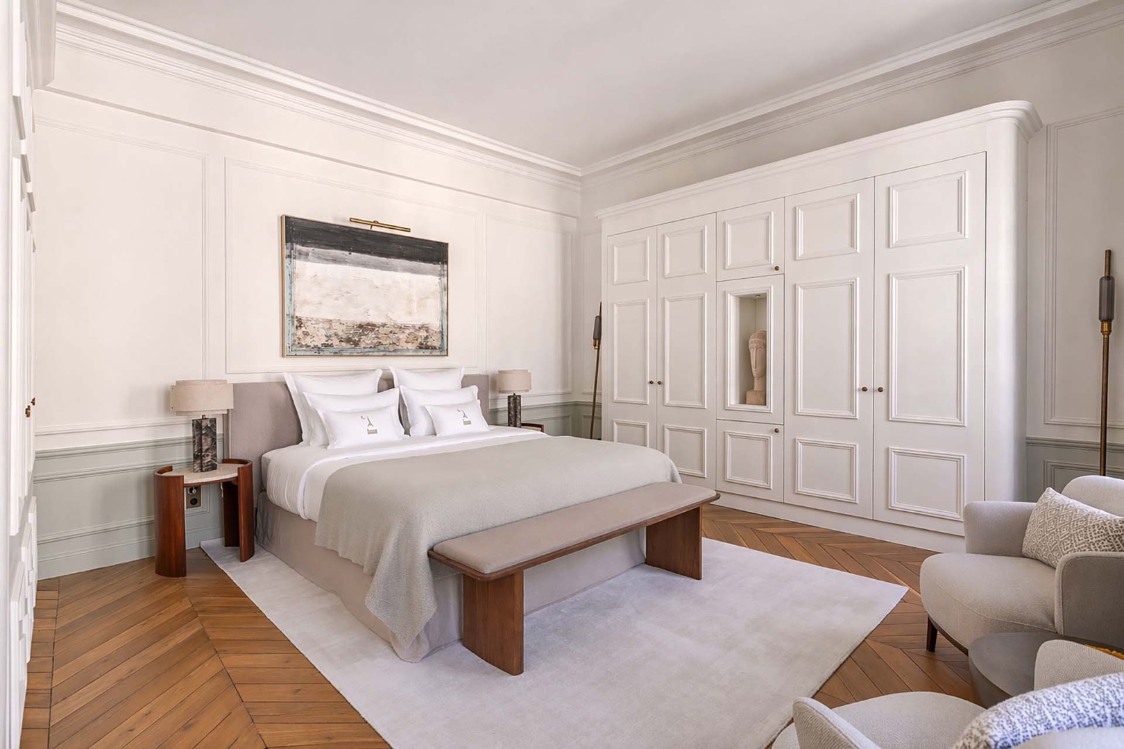 Luxurious built in storage lines two walls in bedroom 1.