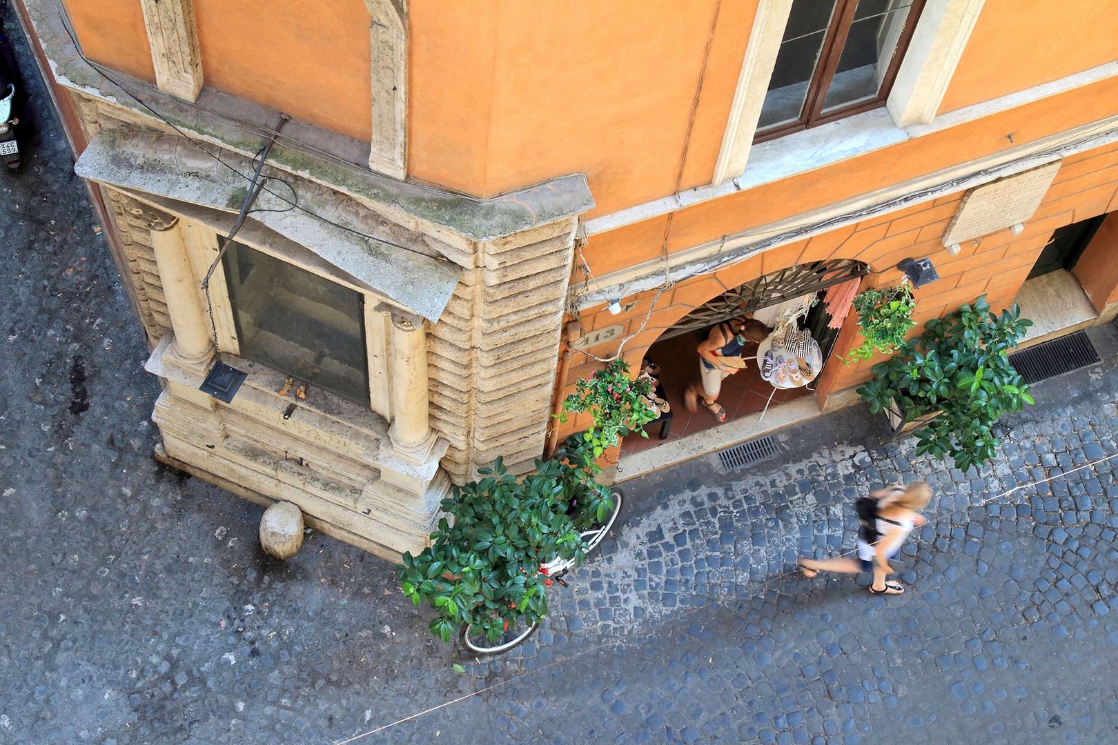 View from apartment onto small piazza offering a slice of Roman life.