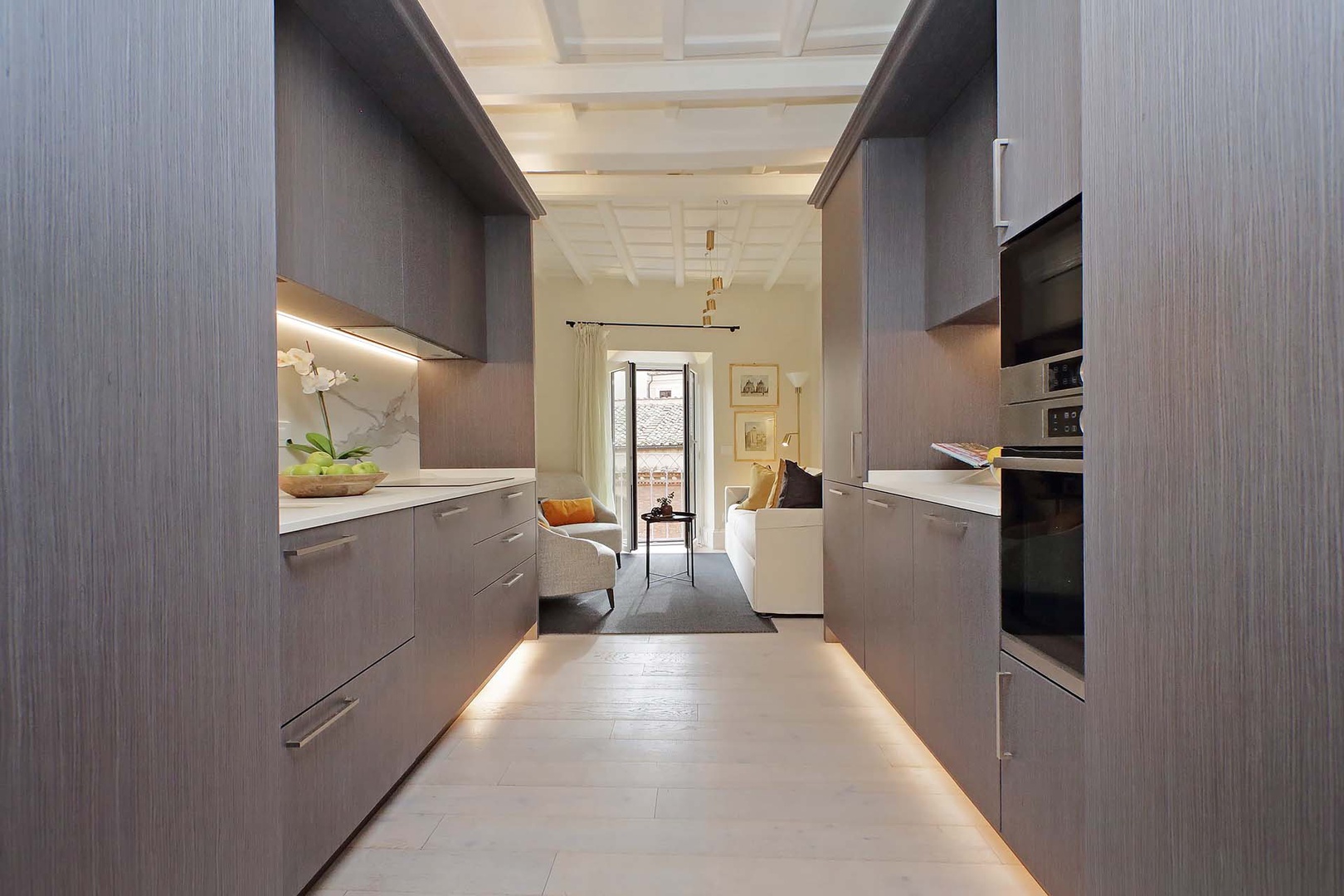 The kitchen has a sleek and modern design.