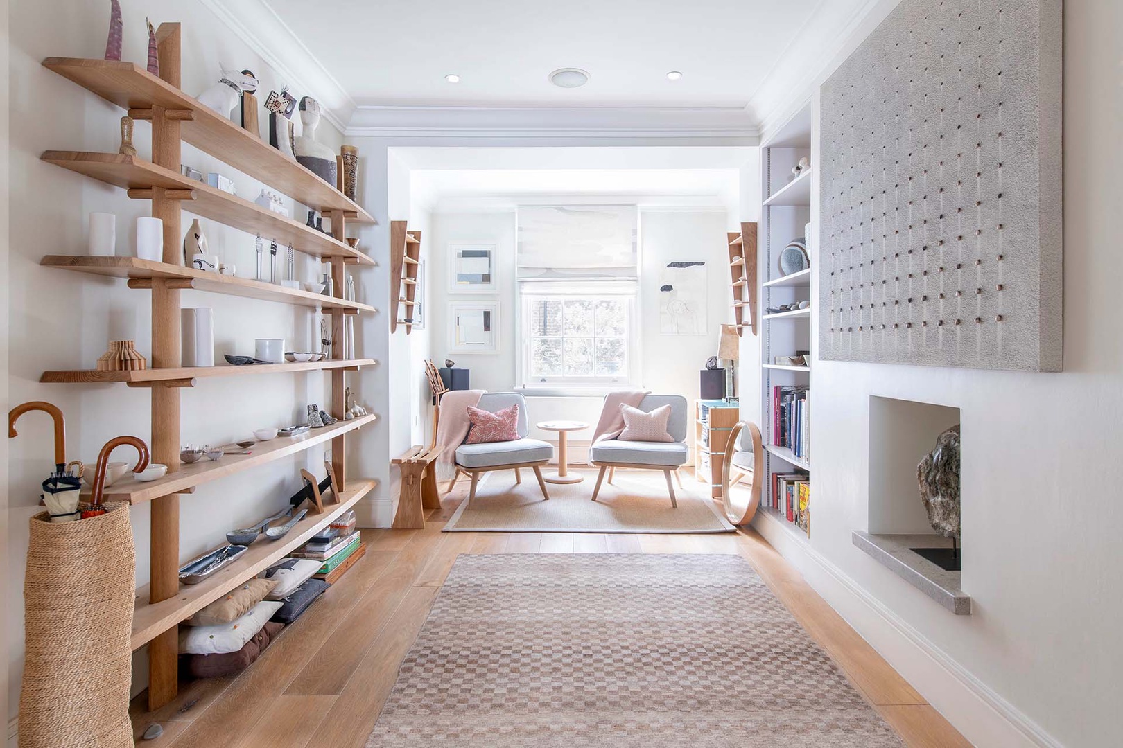 Double living room on the ground level is full of light.