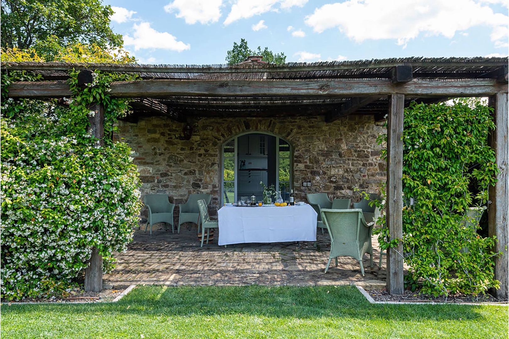 Dine al fresco at lovely patio area of the barn.