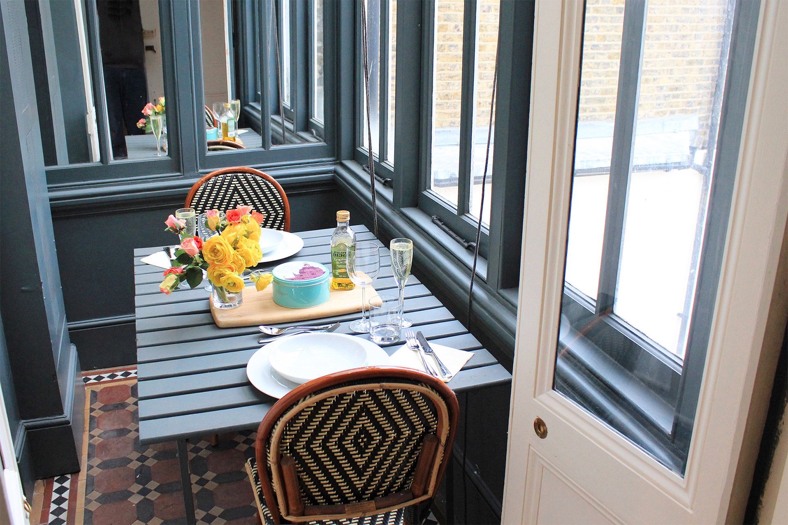 Dining area with historic tile flooring