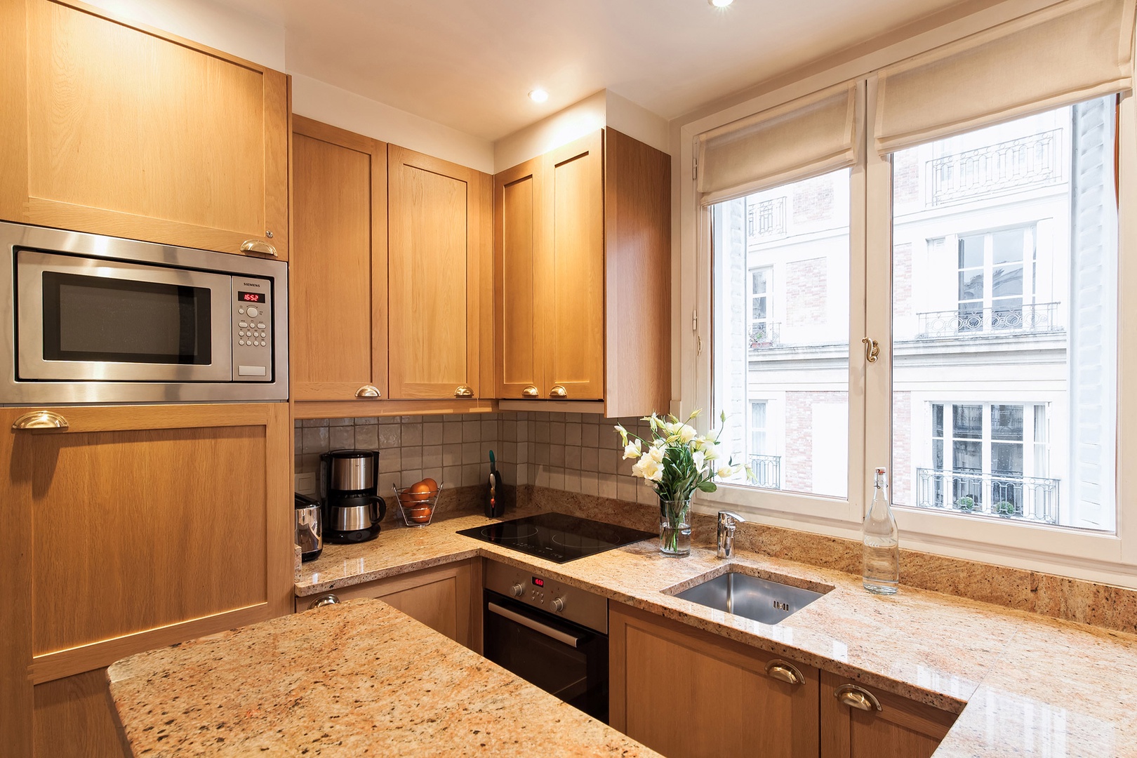 The kitchen is fully-equipped with quality appliances.