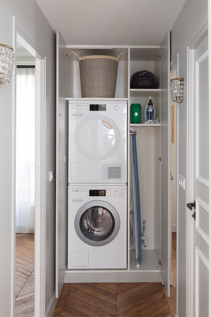 Laundry facilities are hidden in the closet between bedroom 2 and 3.