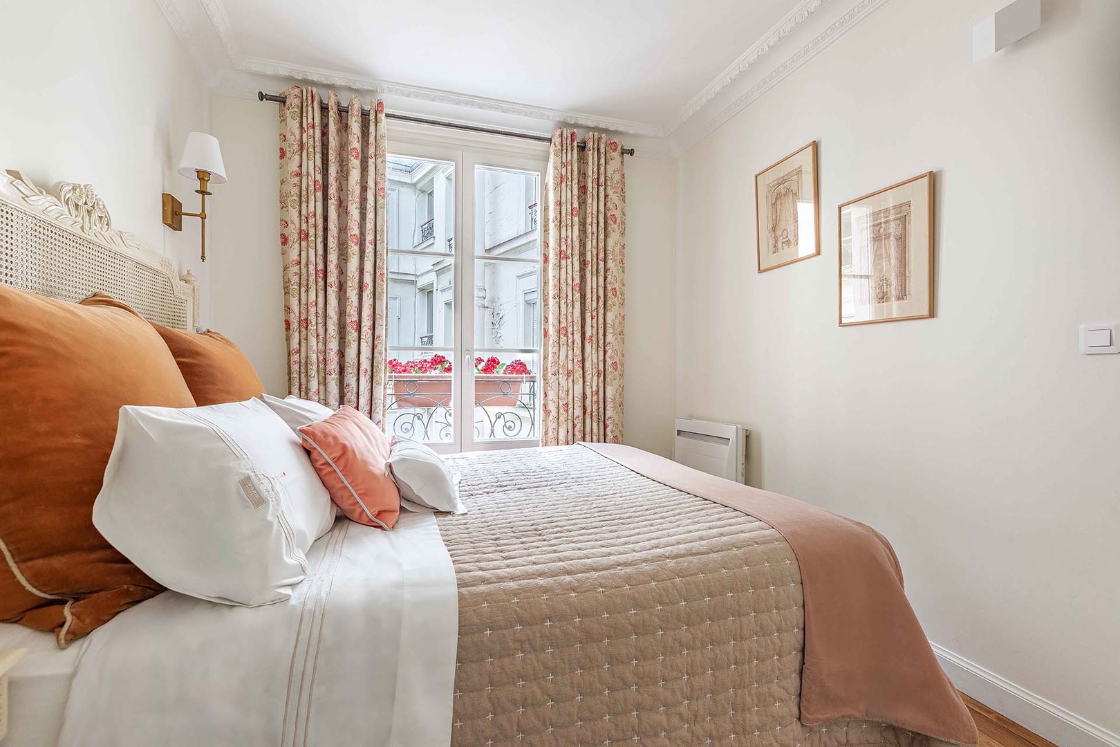 Lovely French bedroom with a comfortable bed.