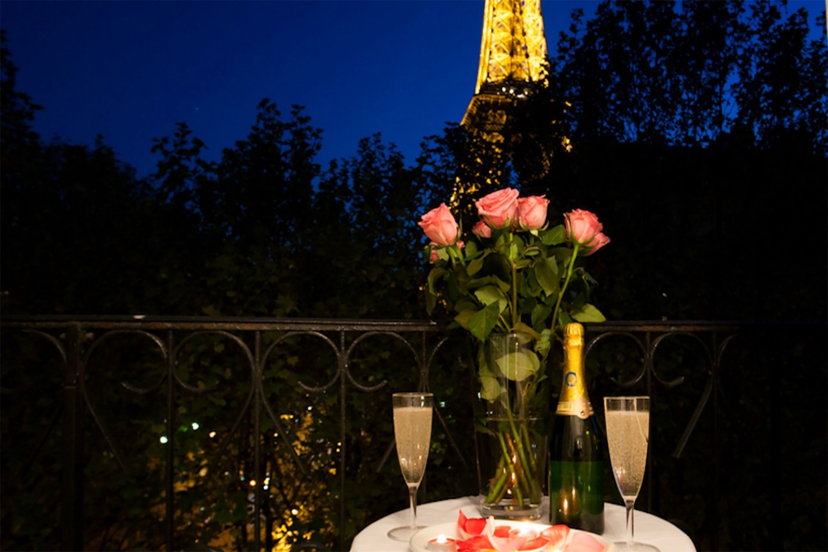 Enjoy cozy evenings on the balcony with fantastic Eiffel Tower views.