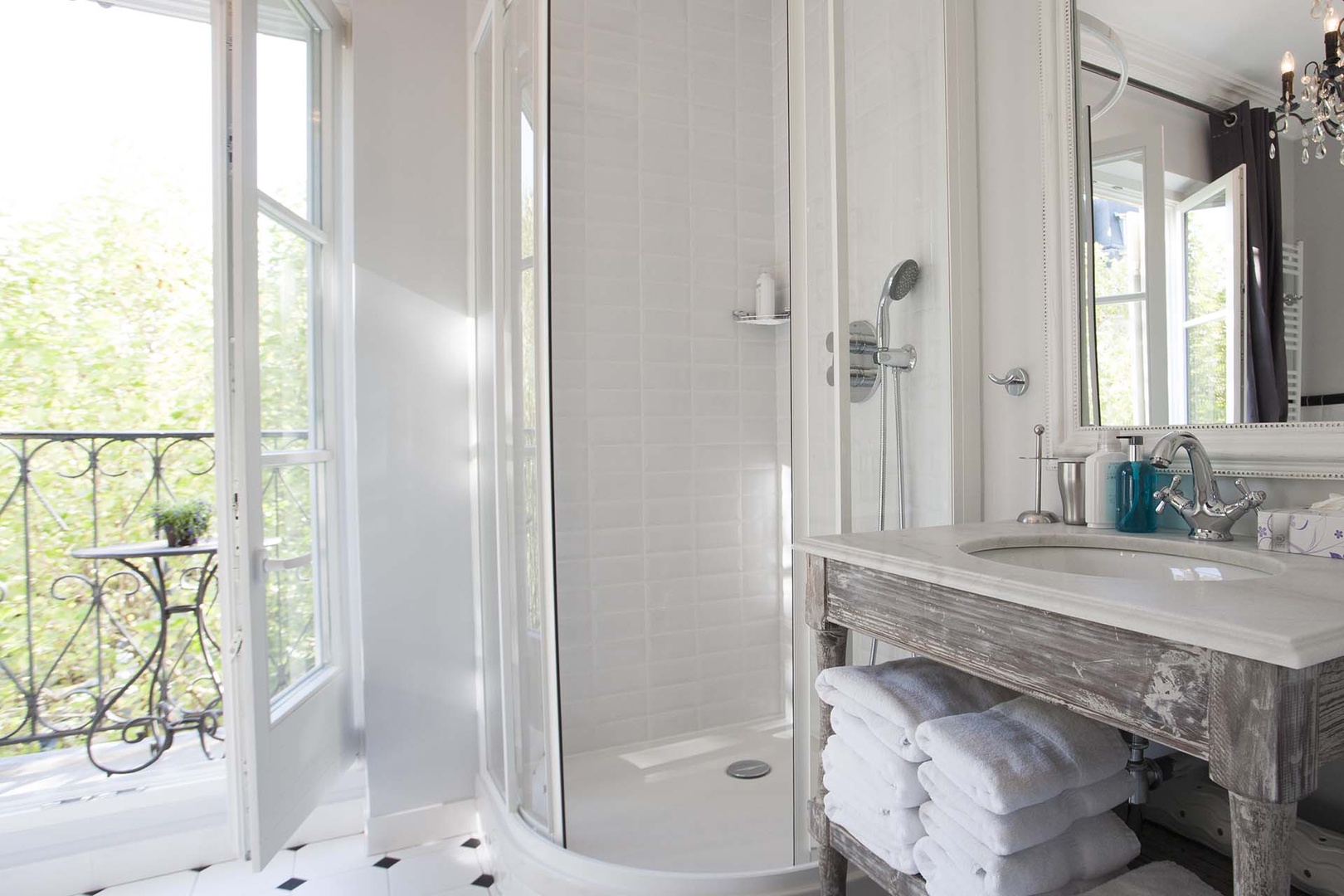 The bright bathroom also features a large shower.