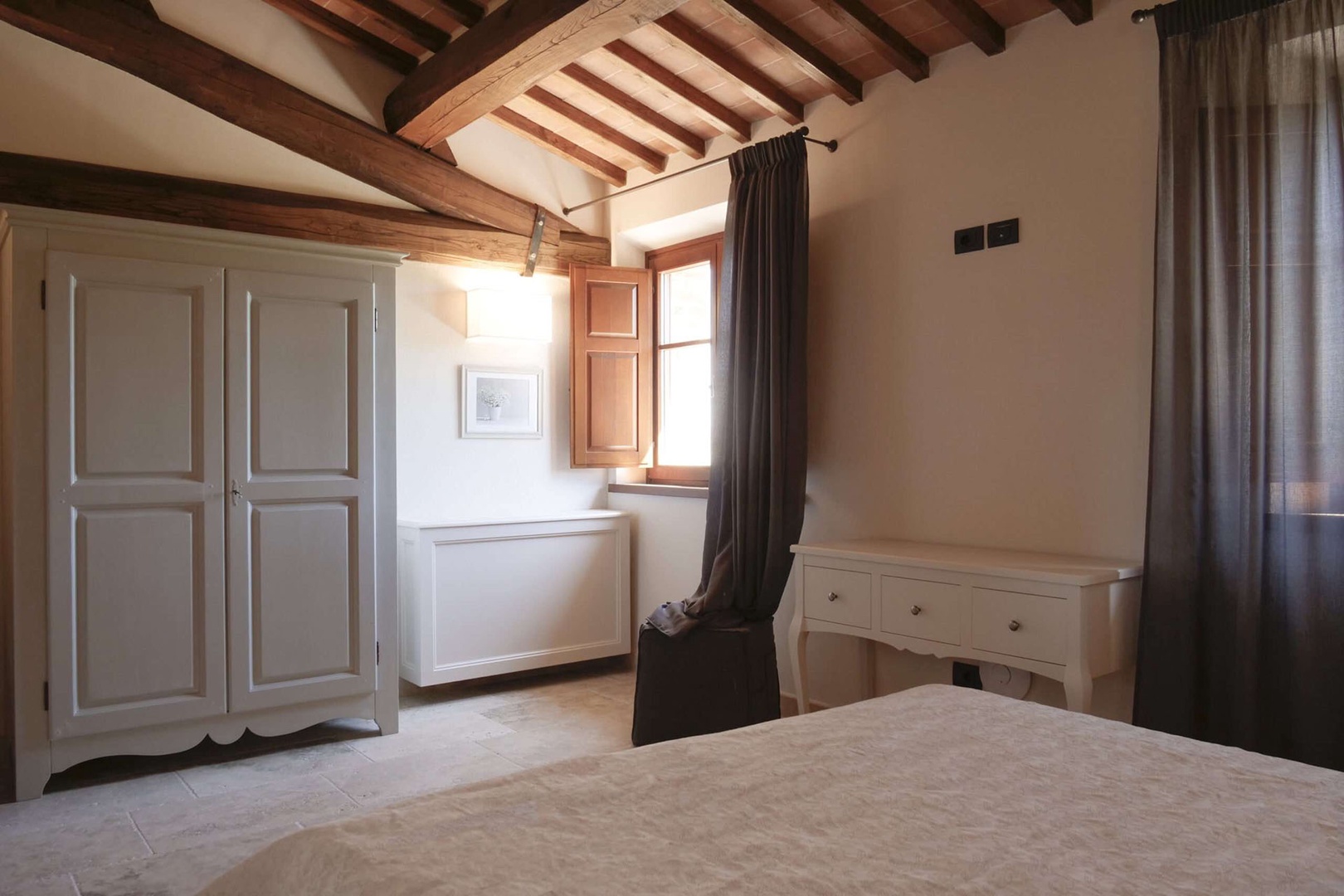 Spacious bedroom 1 in the villa.