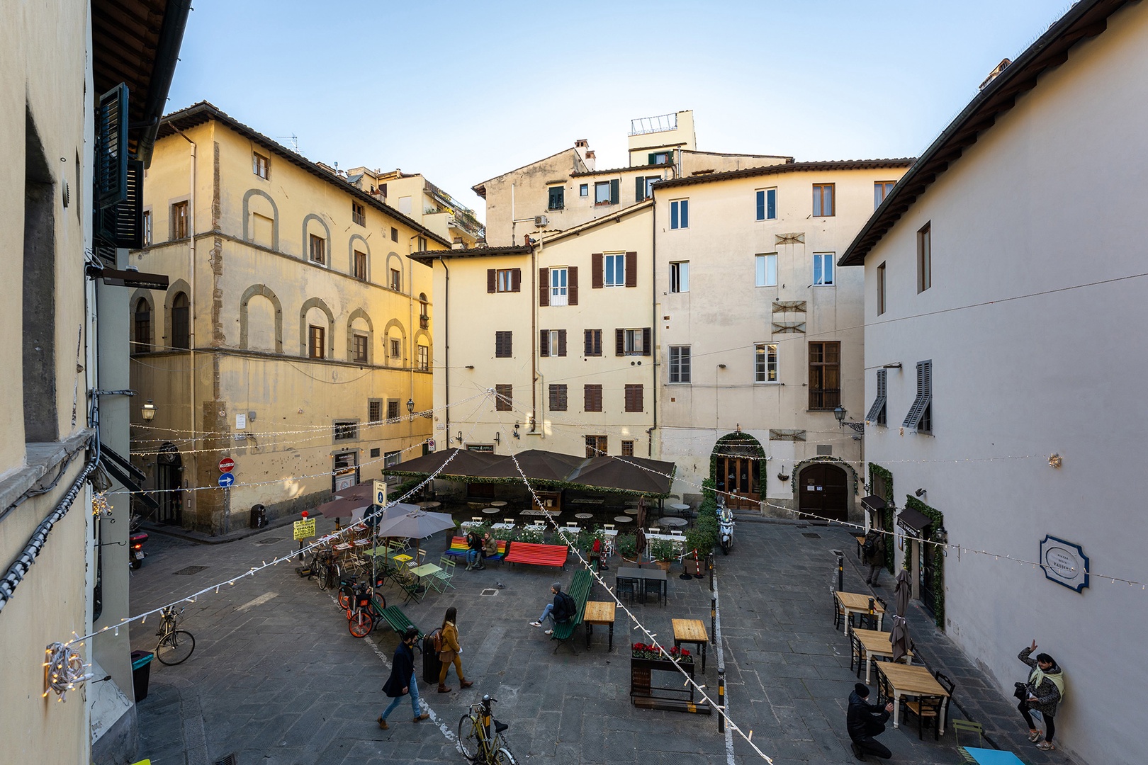 Lean out the window and look down the street towards the cafe's and restaurants in nearby Piazza della Passera.