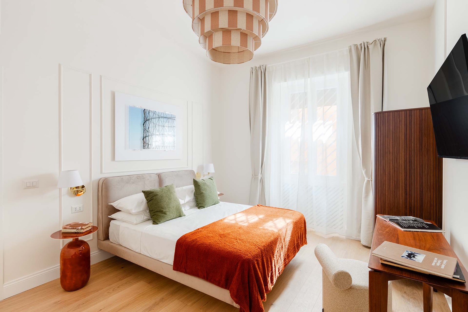 Bedroom 1 is bright and refreshingly designed.