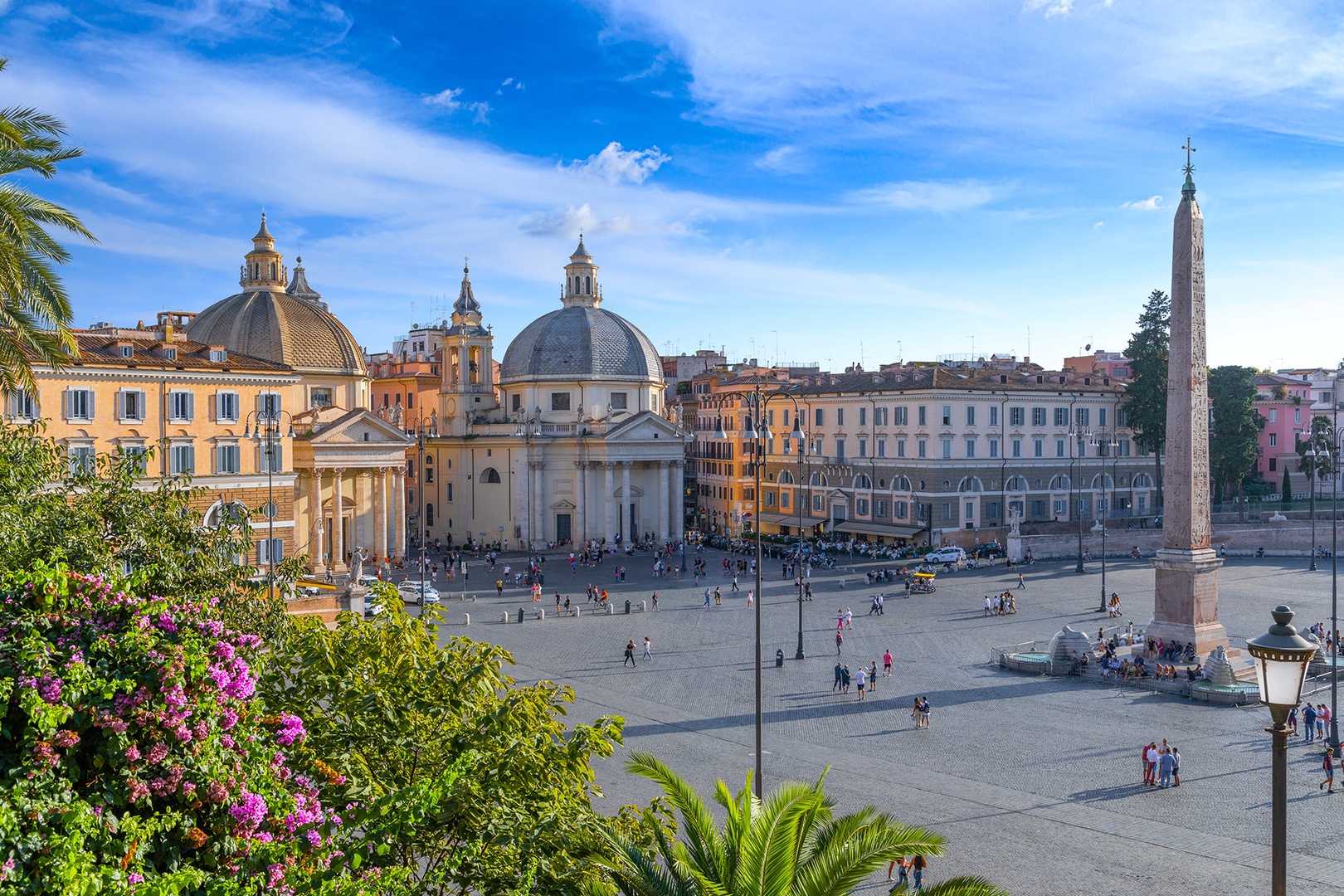 Stroll through the impressive Piazza del Popolo.