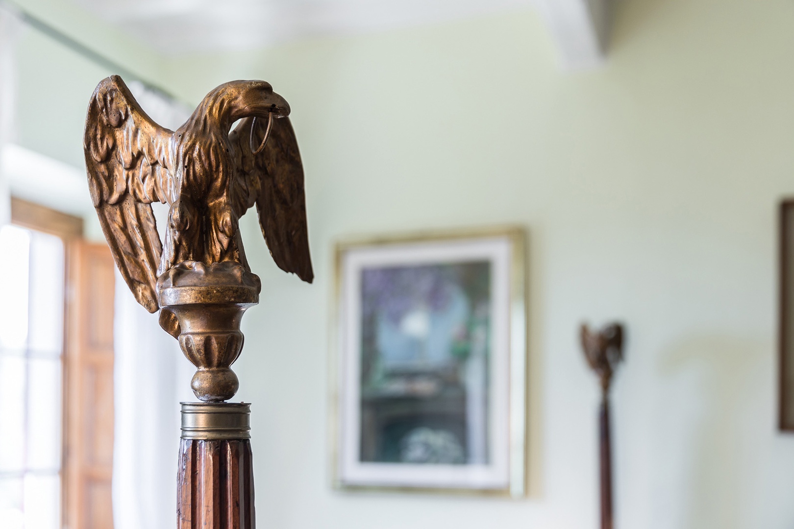 The original bedstead. Each column is topped by an eagle.