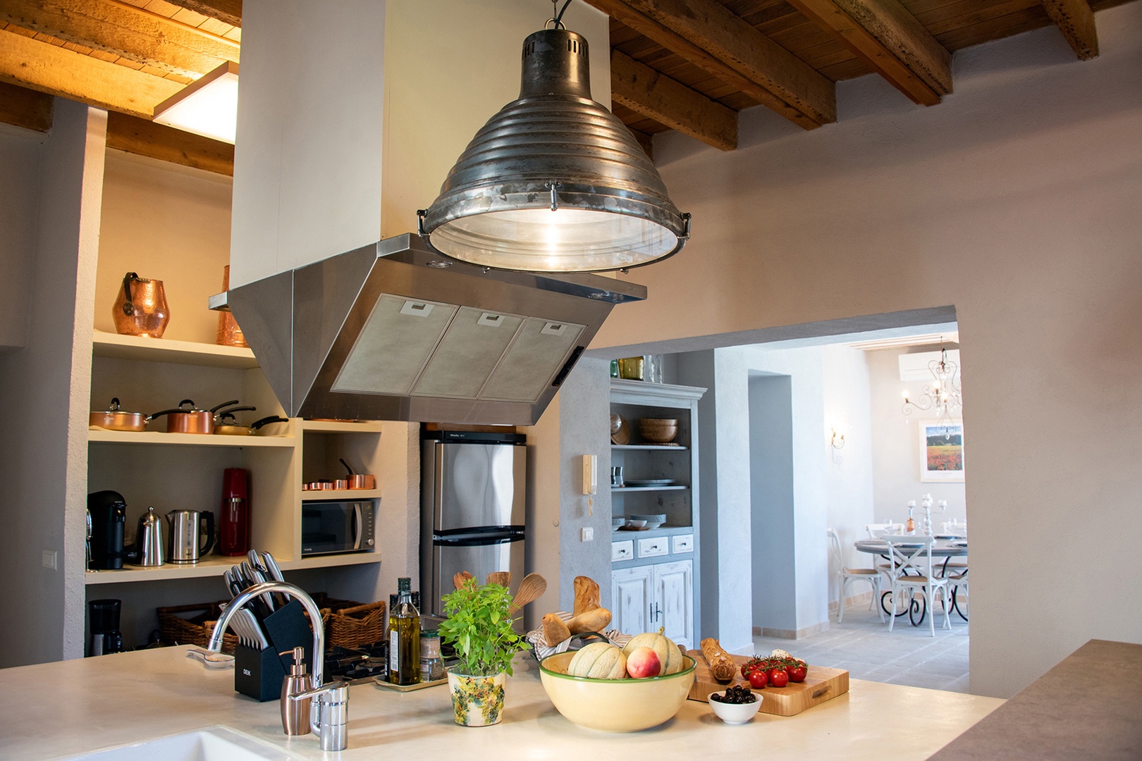 Dining table is located near the kitchen.