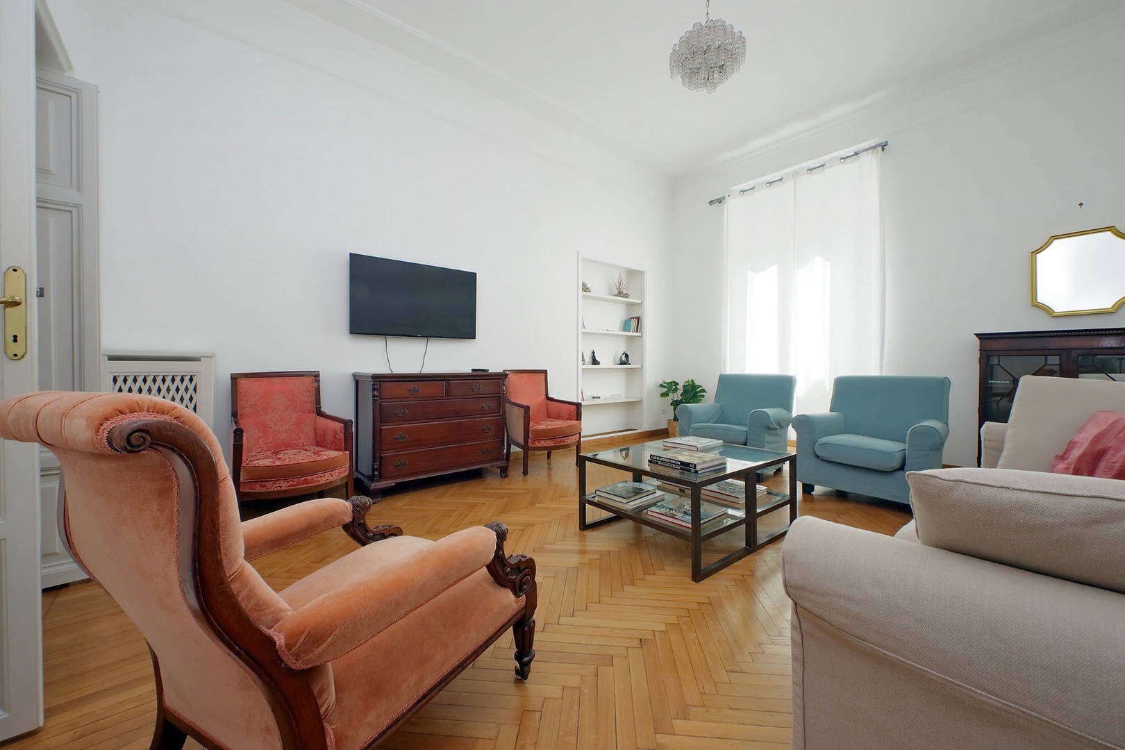 Bright living room and large tv.