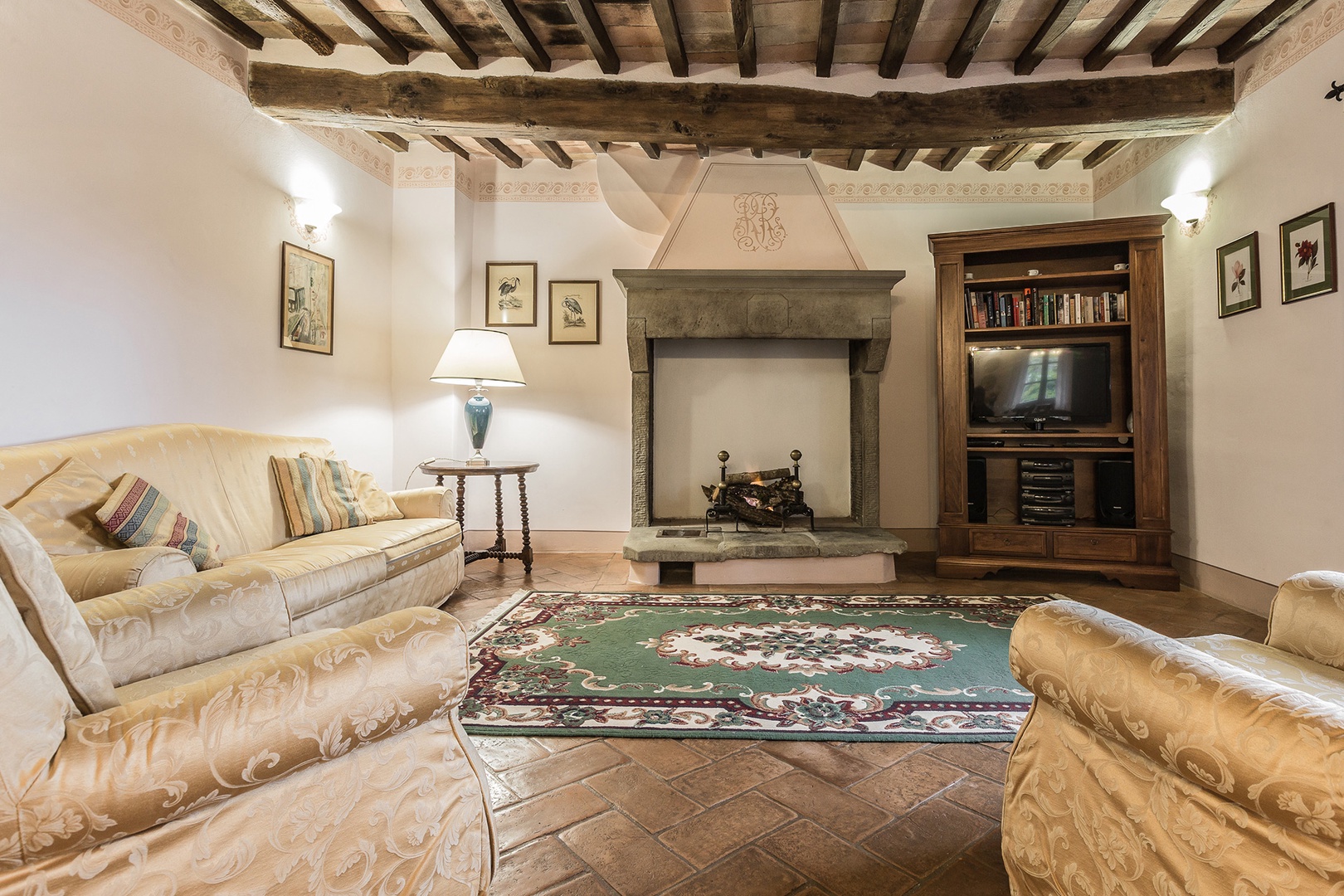 Nice to have a separate lounge area for TV watching. Check the date on the fireplace.