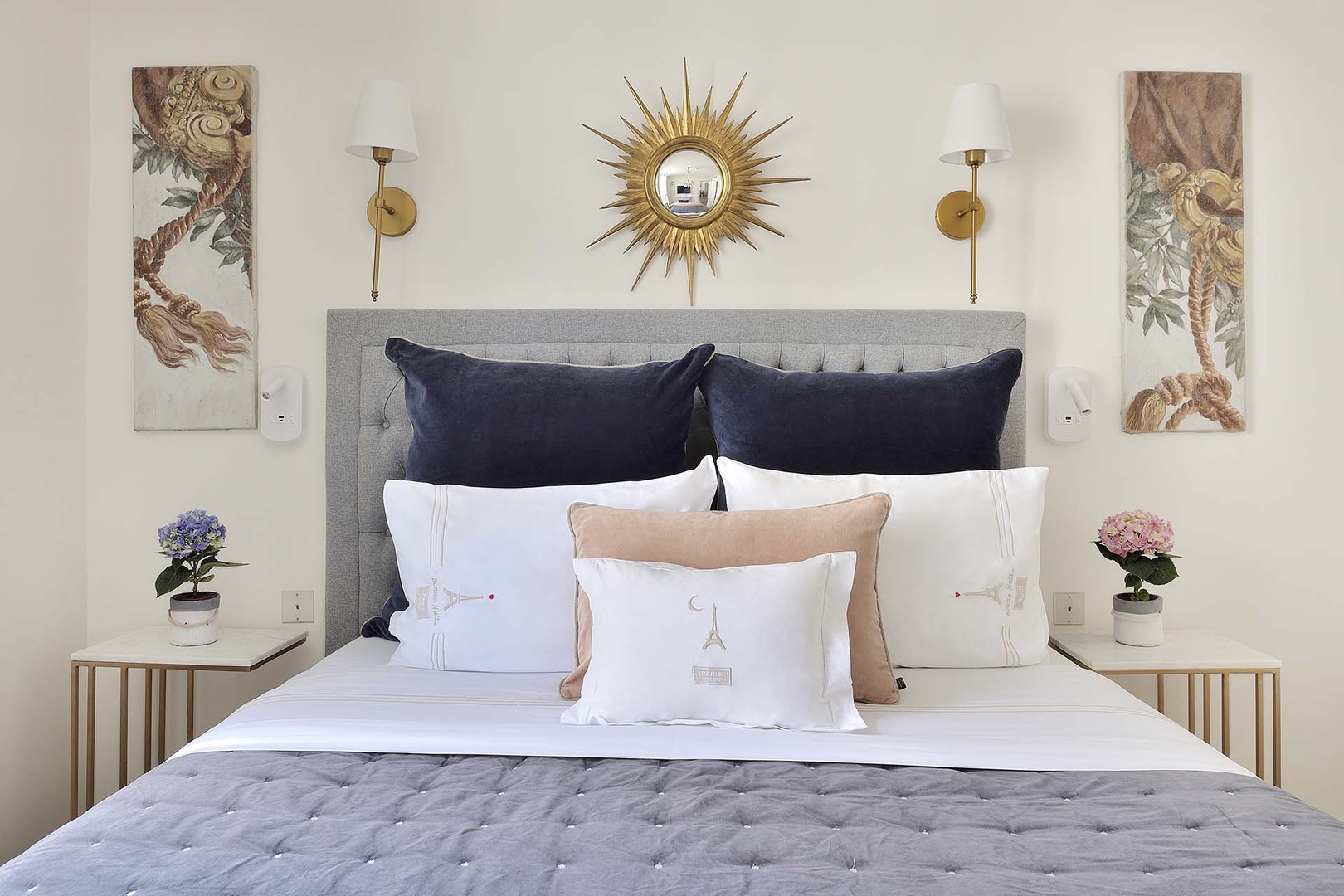 Relax with a book on the sumptuous bed.