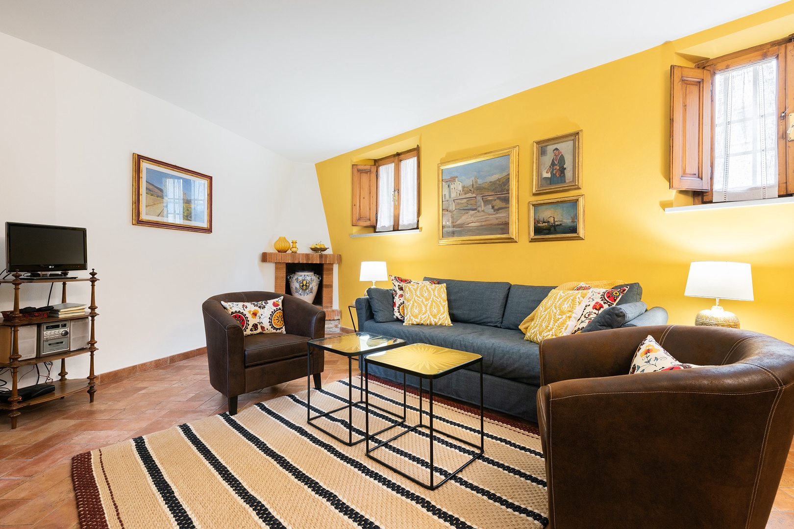 The colors of the Tuscan sun illuminate the living room.
