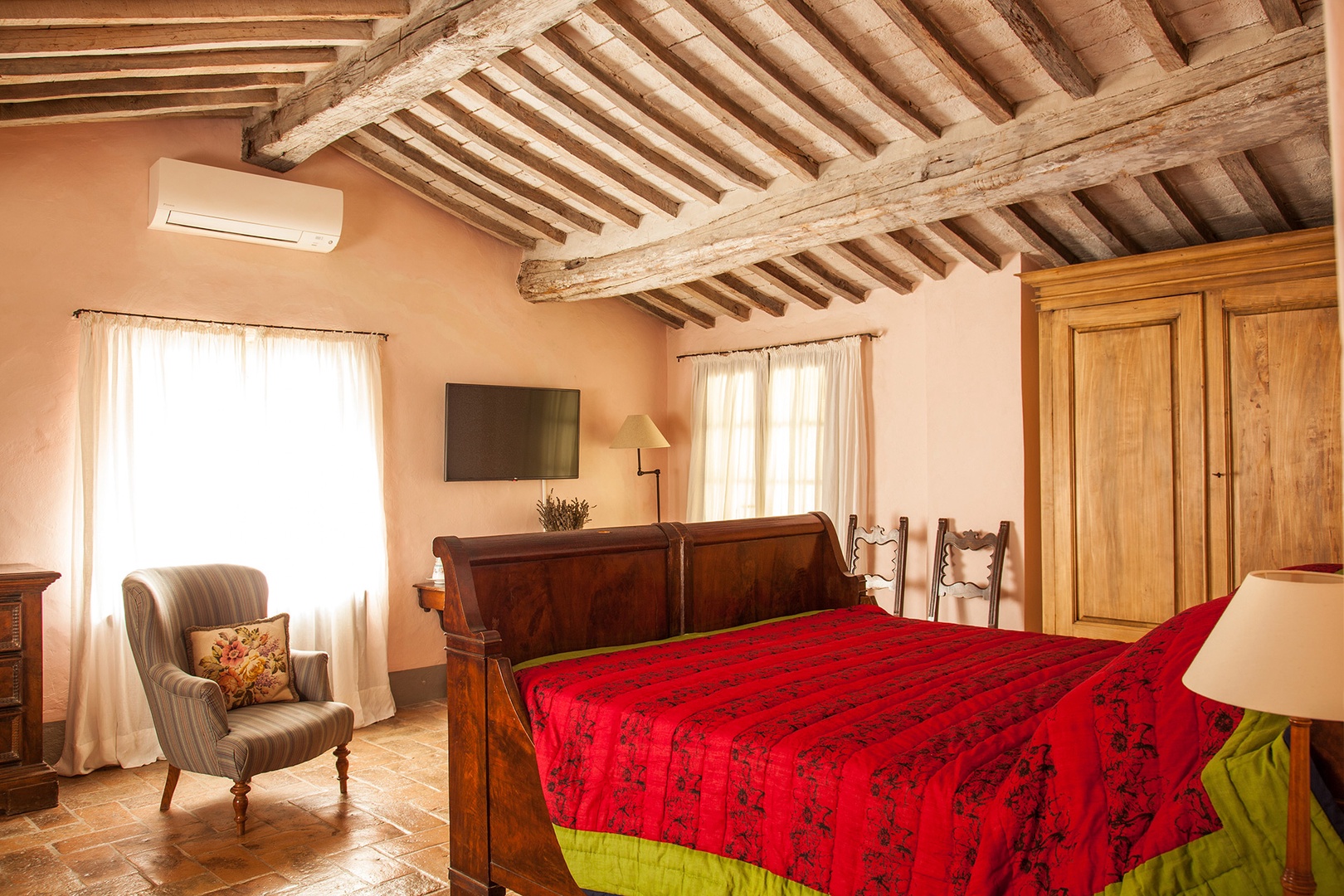 Beautiful rustic beamed ceilings in the upstairs bedroom 3.