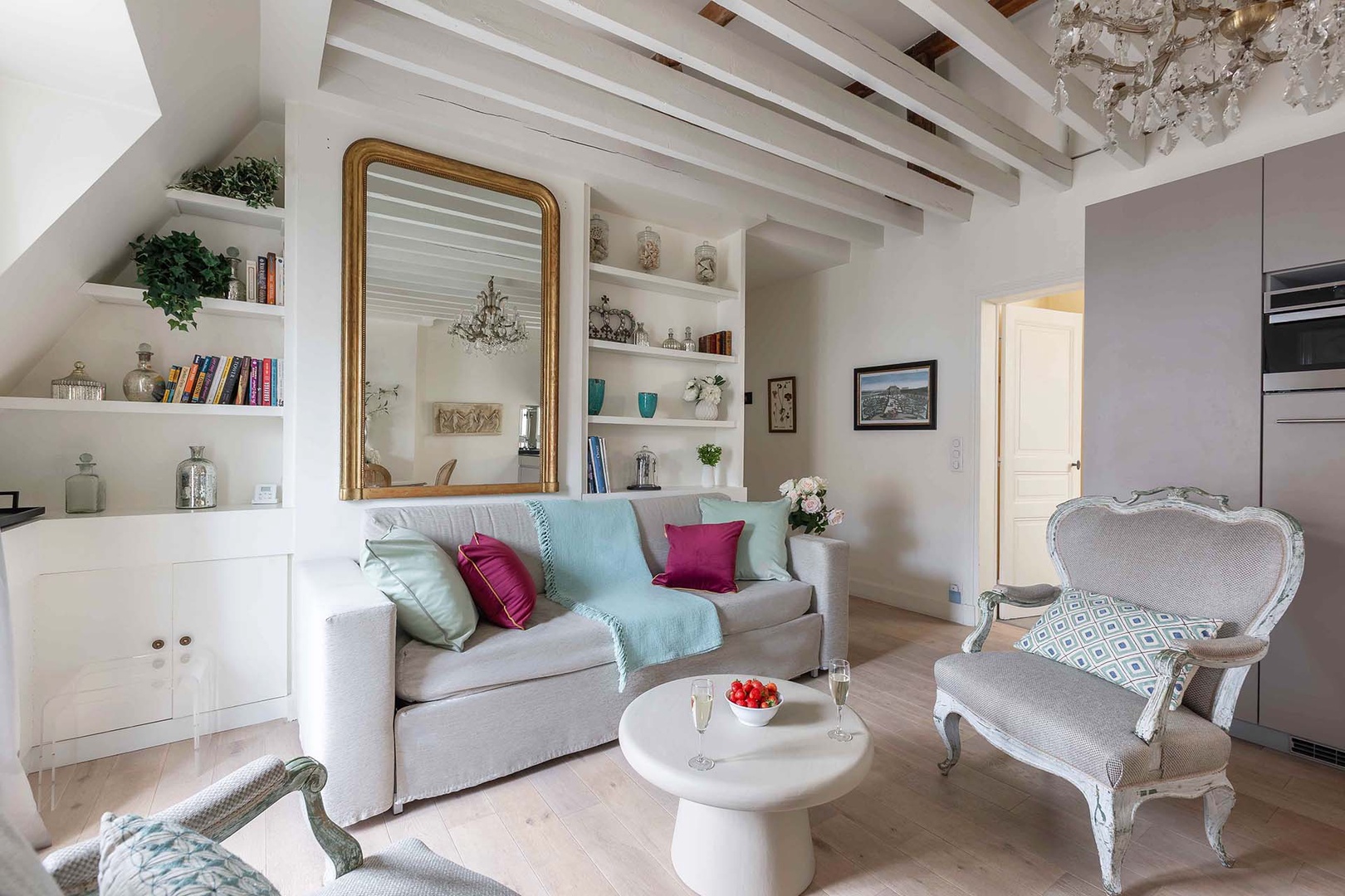 Wooden ceiling beams add a historic touch.