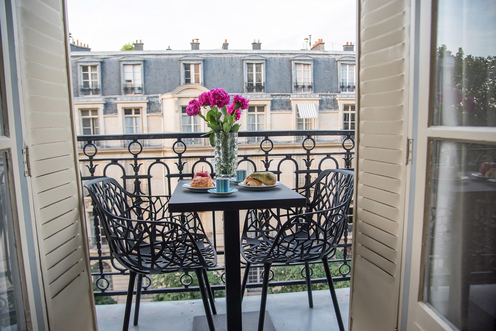 Soak in the Parisian atmosphere on your private balcony.