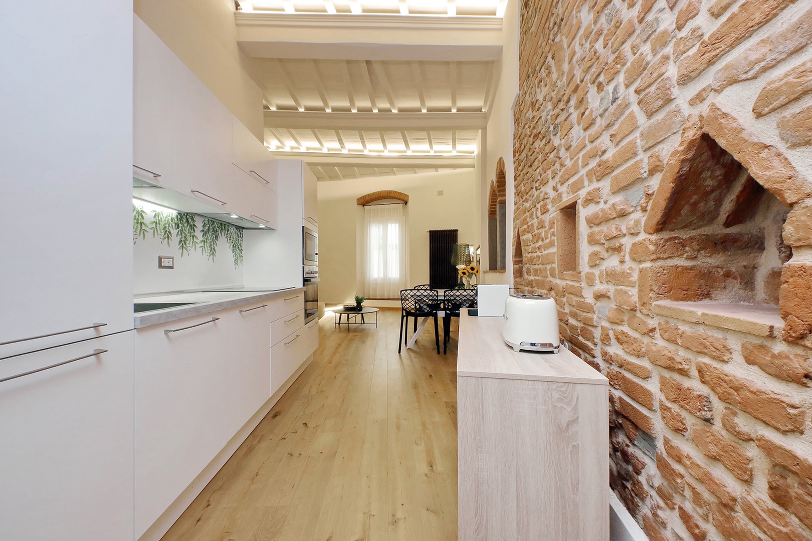 The kitchen opens up to the dining area and living room.