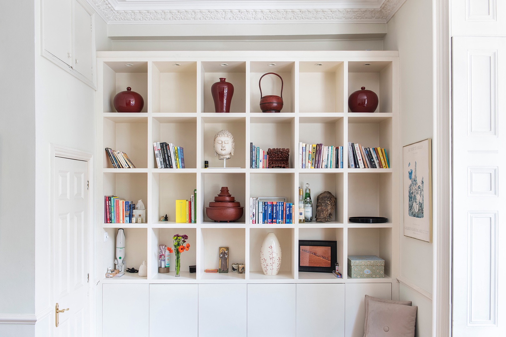 Charming bookshelf and decor in the living room.