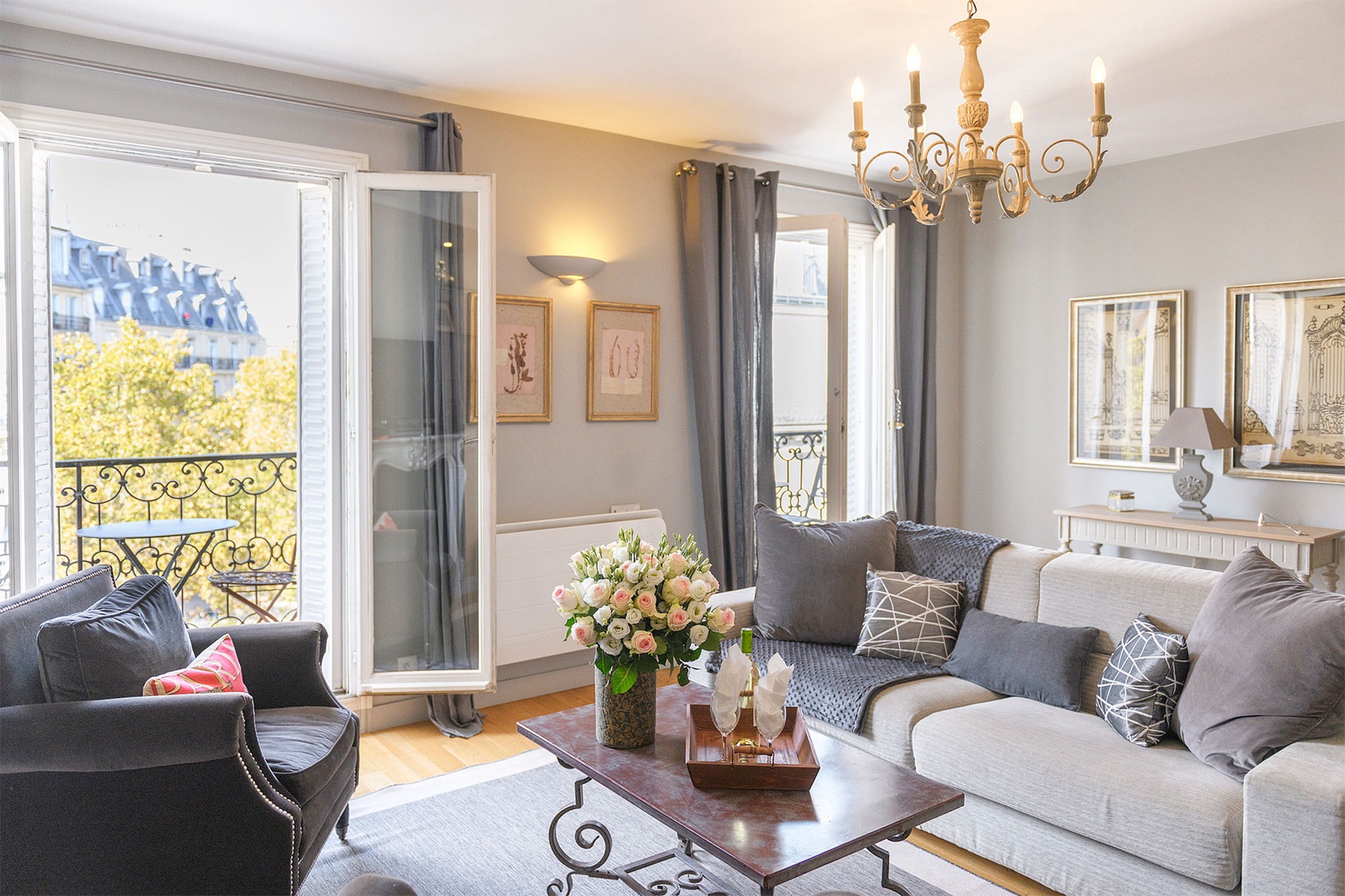 The spacious living room is perfect for celebrating your Paris vacation in comfort.