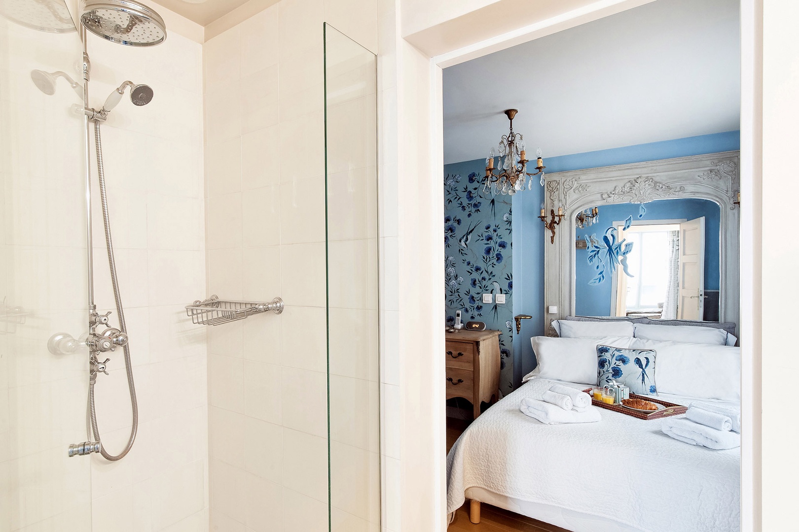 Bathroom 2 features a modern shower and sink.