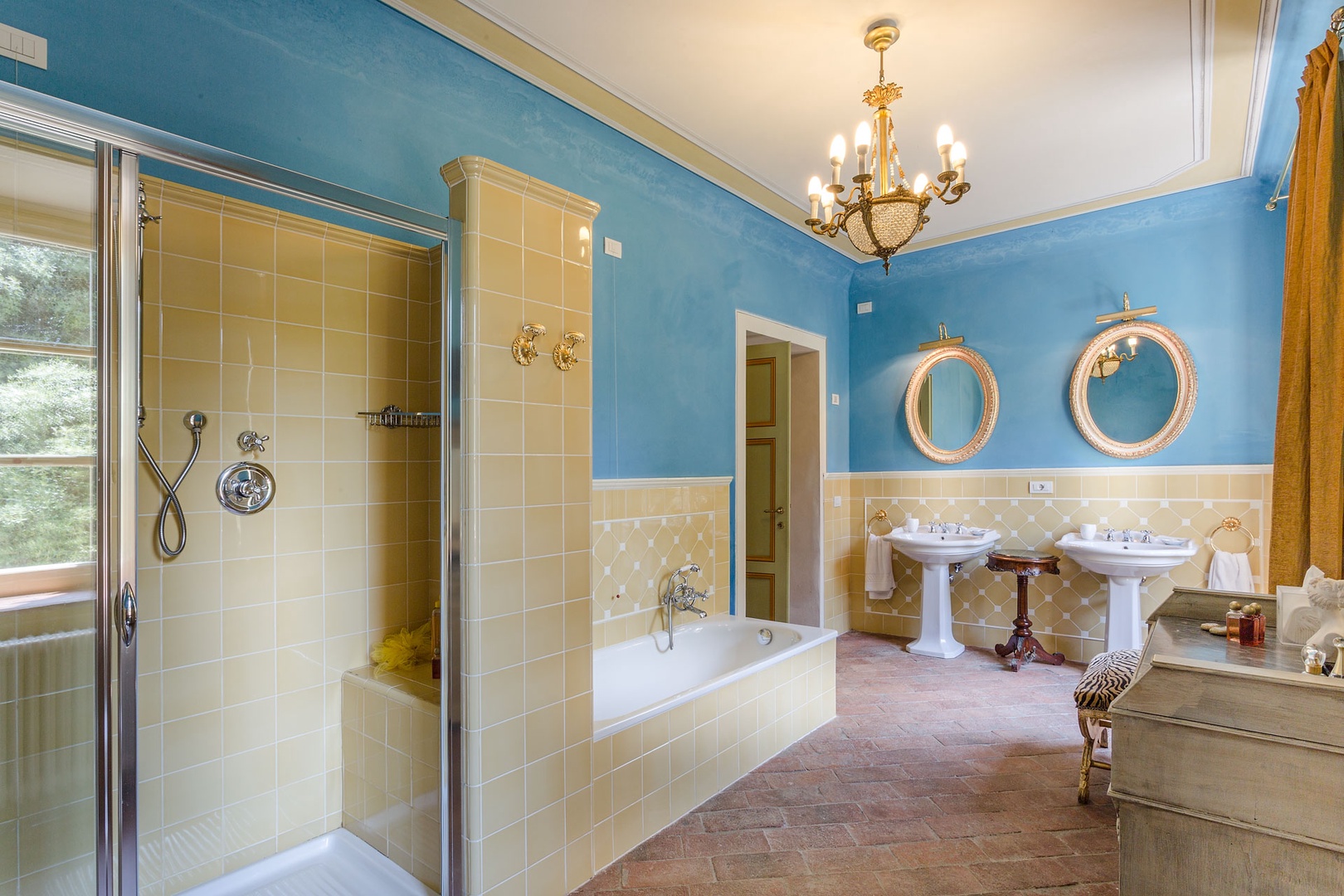 En suite bathroom with shower and bathtub