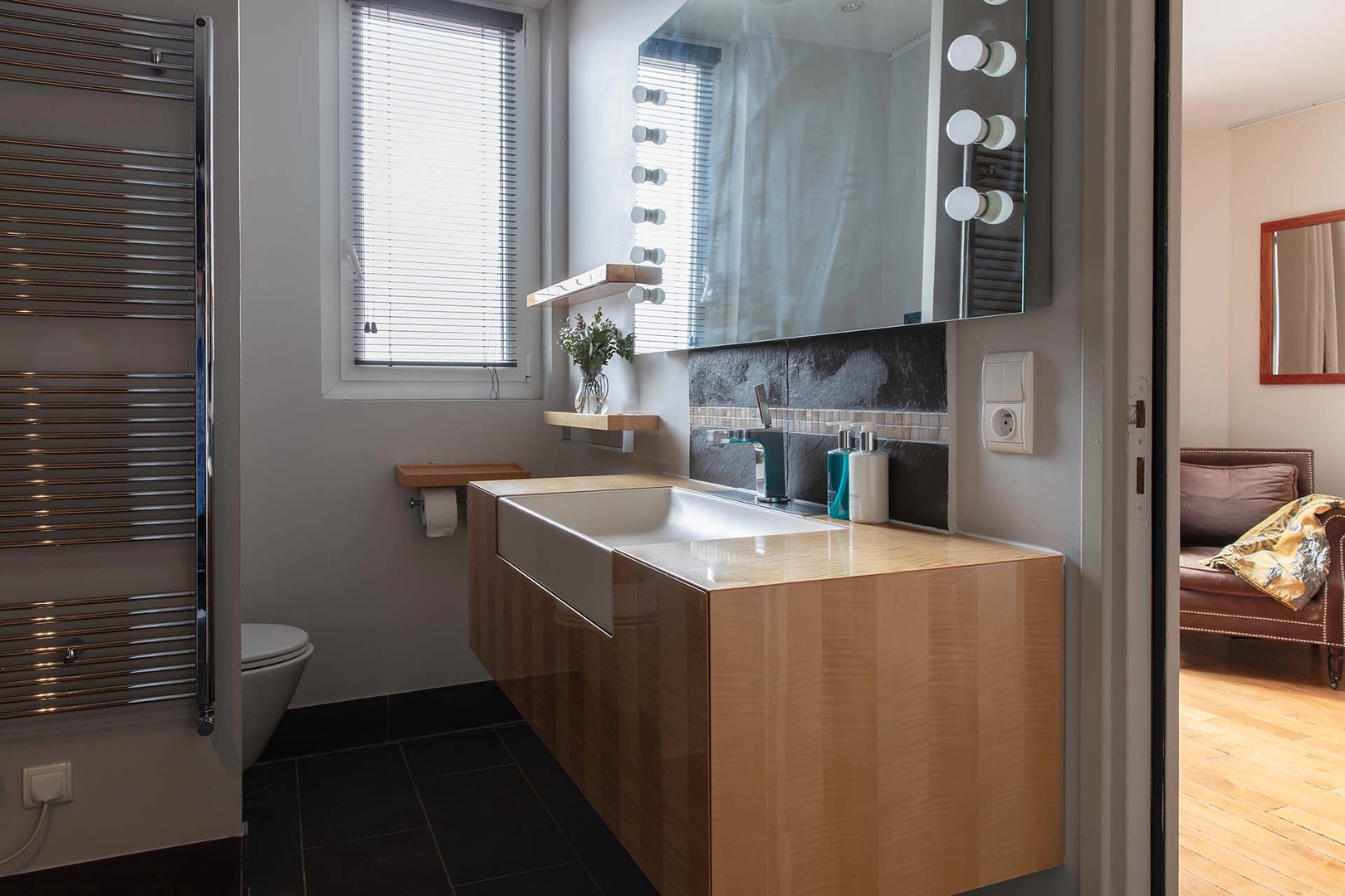 En suite bathroom with shower, toilet and large sink.